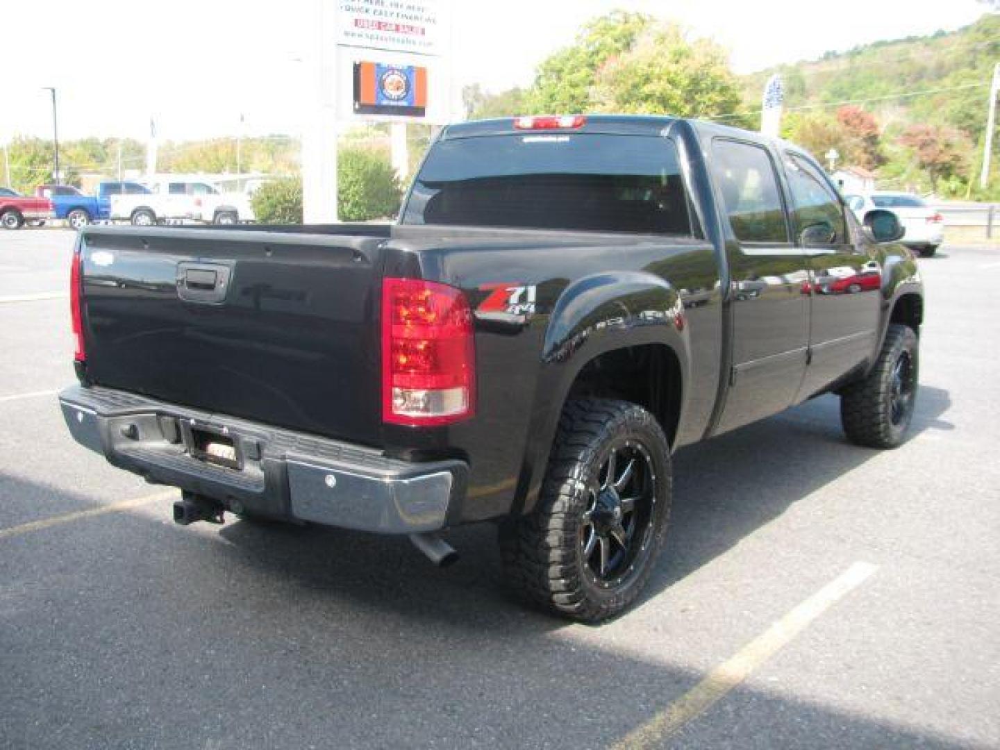 2012 Black GMC Sierra 1500 SLE Crew Cab 4WD (3GTP2VE78CG) with an 5.3L V8 OHV 16V FFV engine, 6-Speed Automatic transmission, located at 2443 Albert Pike, Hot Springs, AR, 71913, (501) 623-6255, 34.492222, -93.109993 - Photo#4