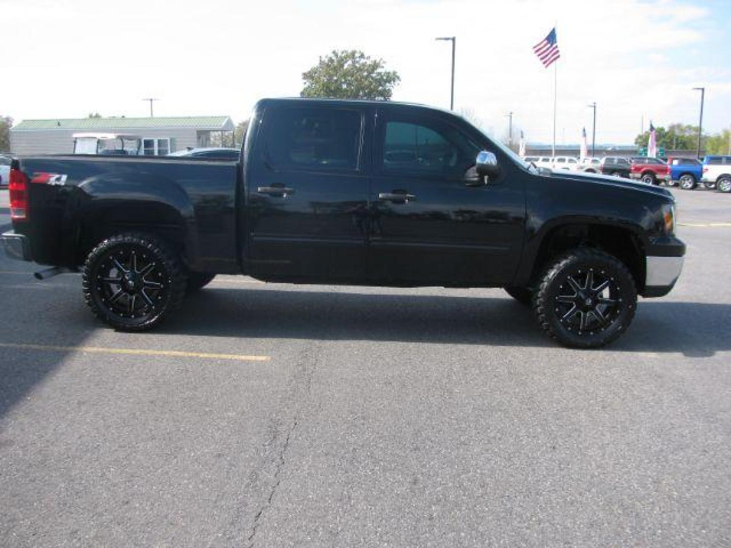 2012 Black GMC Sierra 1500 SLE Crew Cab 4WD (3GTP2VE78CG) with an 5.3L V8 OHV 16V FFV engine, 6-Speed Automatic transmission, located at 2443 Albert Pike, Hot Springs, AR, 71913, (501) 623-6255, 34.492222, -93.109993 - Photo#5