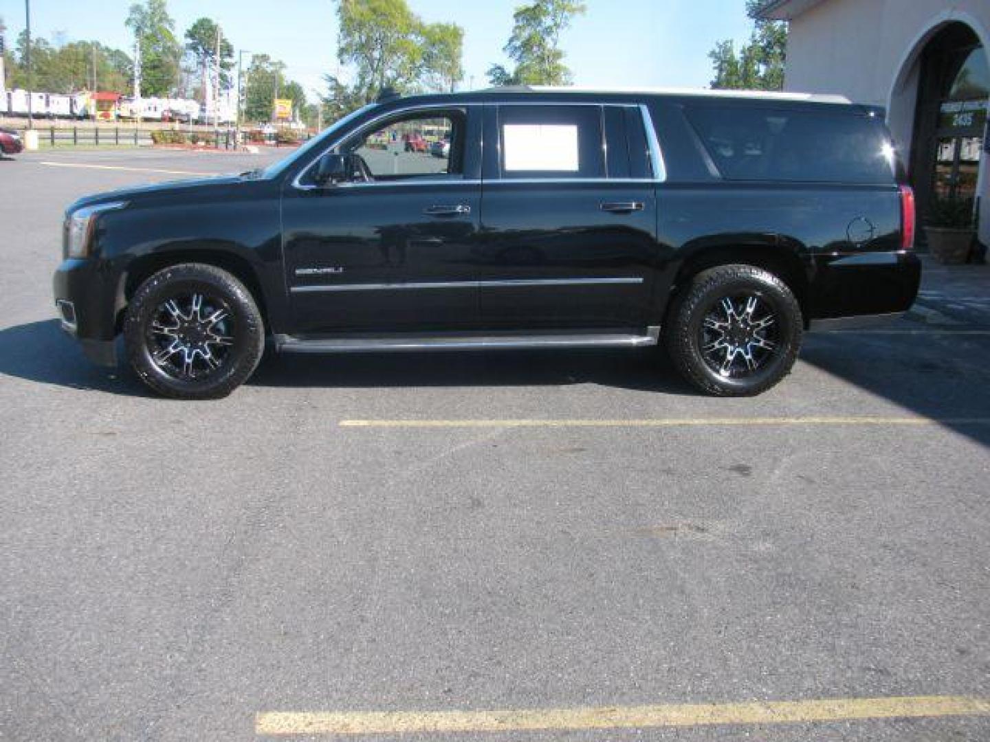 2016 Black GMC Yukon XL Denali 4WD (1GKS2HKJ1GR) with an 6.2L V8 OHV 16V engine, 6-Speed Automatic transmission, located at 2443 Albert Pike, Hot Springs, AR, 71913, (501) 623-6255, 34.492222, -93.109993 - Photo#1