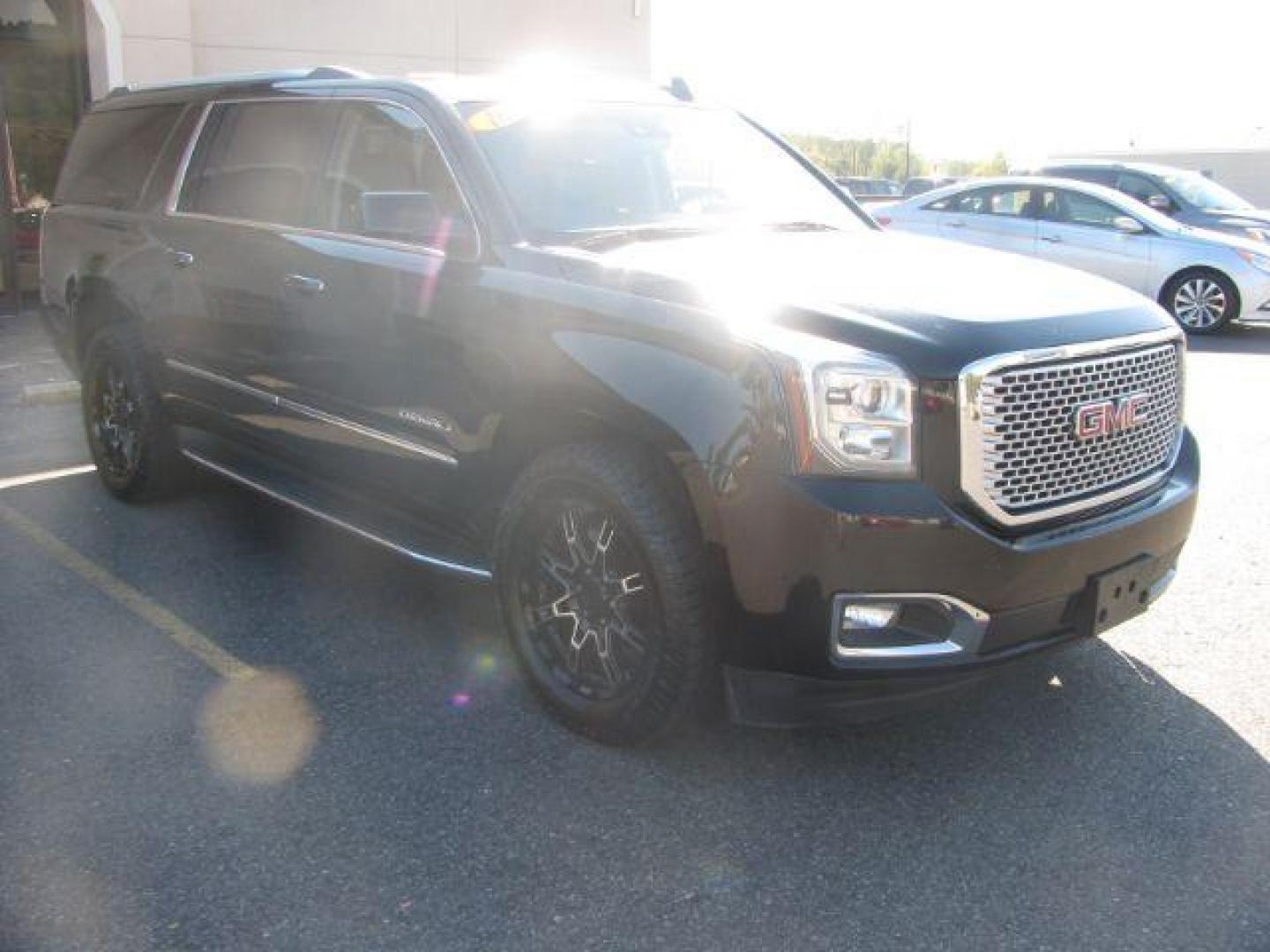 2016 Black GMC Yukon XL Denali 4WD (1GKS2HKJ1GR) with an 6.2L V8 OHV 16V engine, 6-Speed Automatic transmission, located at 2443 Albert Pike, Hot Springs, AR, 71913, (501) 623-6255, 34.492222, -93.109993 - Photo#5