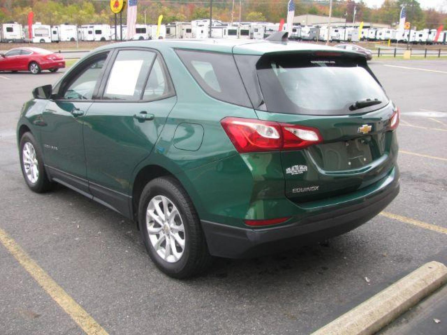 2019 Green Chevrolet Equinox LS 2WD (2GNAXHEV8K6) with an 1.5L L4 DIR DOHC 16V TURBO engine, 6-Speed Automatic transmission, located at 2443 Albert Pike, Hot Springs, AR, 71913, (501) 623-6255, 34.492222, -93.109993 - Photo#2