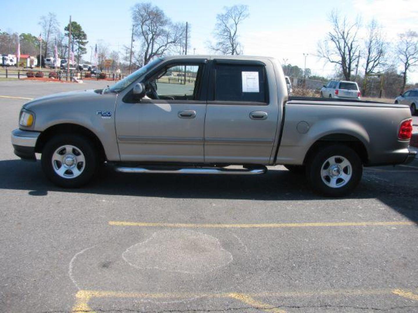 2002 Tan Ford F-150 XLT SuperCrew Short Bed 2WD (1FTRW07642K) with an 4.6L V8 SOHC 16V engine, 4-Speed Automatic transmission, located at 2443 Albert Pike, Hot Springs, AR, 71913, (501) 623-6255, 34.492222, -93.109993 - LISTED FEATURES MAY BE OPTIONAL AND NOT INCLUDED ON THIS VEHICLE!!! - Photo#1