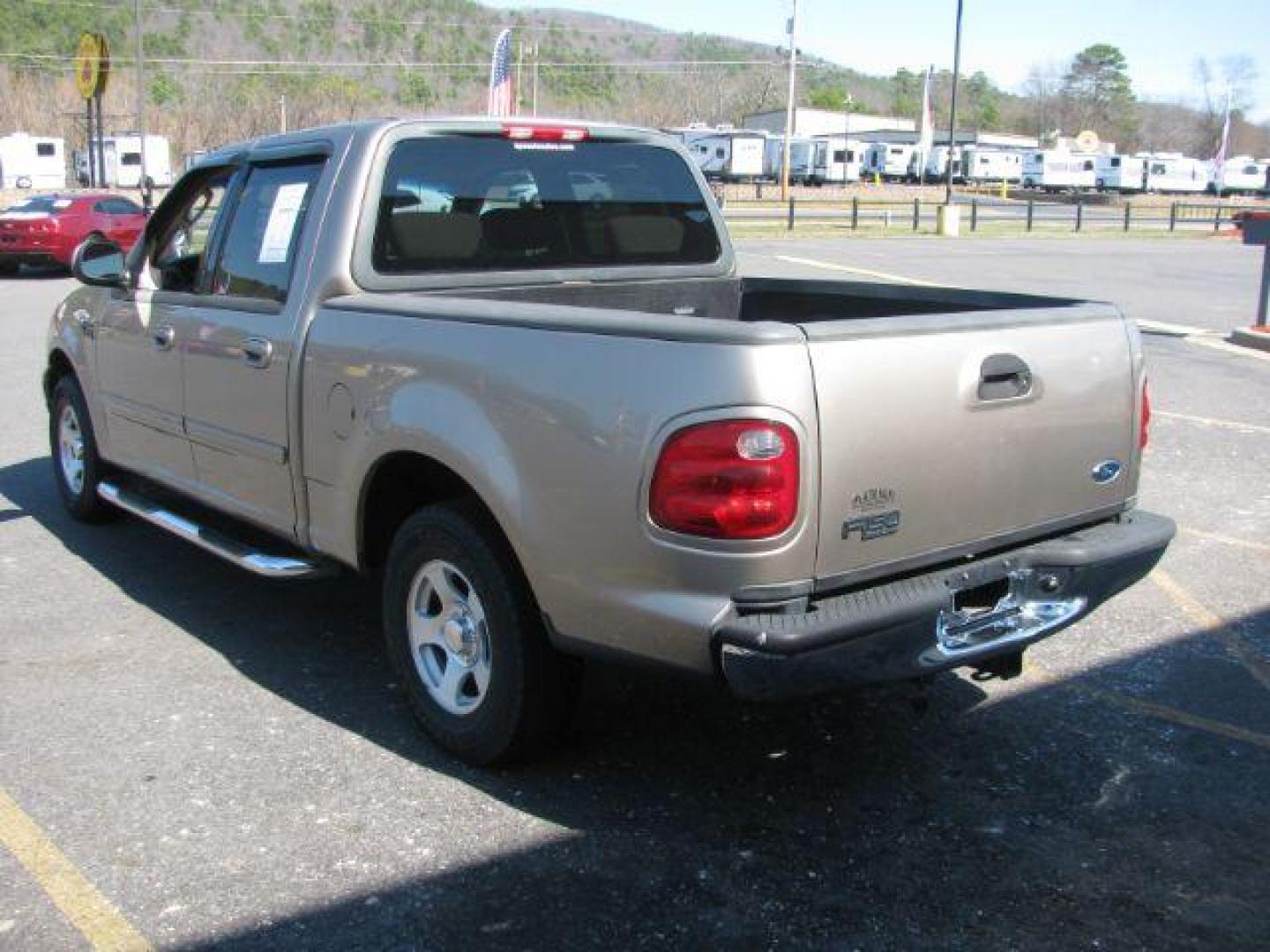 2002 Tan Ford F-150 XLT SuperCrew Short Bed 2WD (1FTRW07642K) with an 4.6L V8 SOHC 16V engine, 4-Speed Automatic transmission, located at 2443 Albert Pike, Hot Springs, AR, 71913, (501) 623-6255, 34.492222, -93.109993 - LISTED FEATURES MAY BE OPTIONAL AND NOT INCLUDED ON THIS VEHICLE!!! - Photo#2