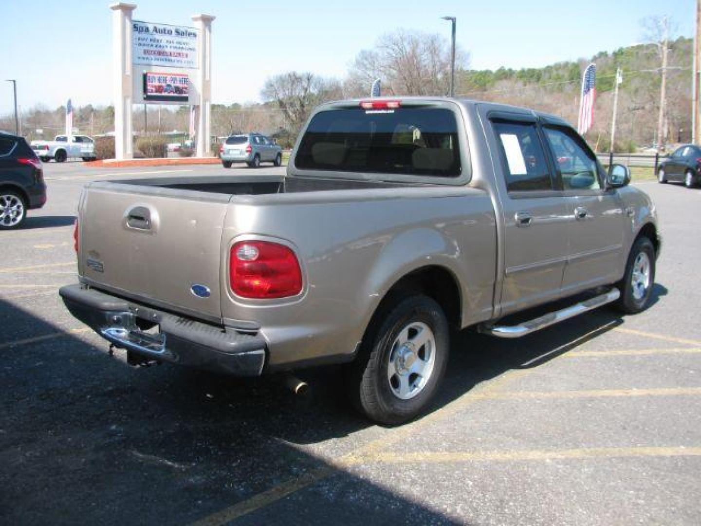 2002 Tan Ford F-150 XLT SuperCrew Short Bed 2WD (1FTRW07642K) with an 4.6L V8 SOHC 16V engine, 4-Speed Automatic transmission, located at 2443 Albert Pike, Hot Springs, AR, 71913, (501) 623-6255, 34.492222, -93.109993 - LISTED FEATURES MAY BE OPTIONAL AND NOT INCLUDED ON THIS VEHICLE!!! - Photo#4