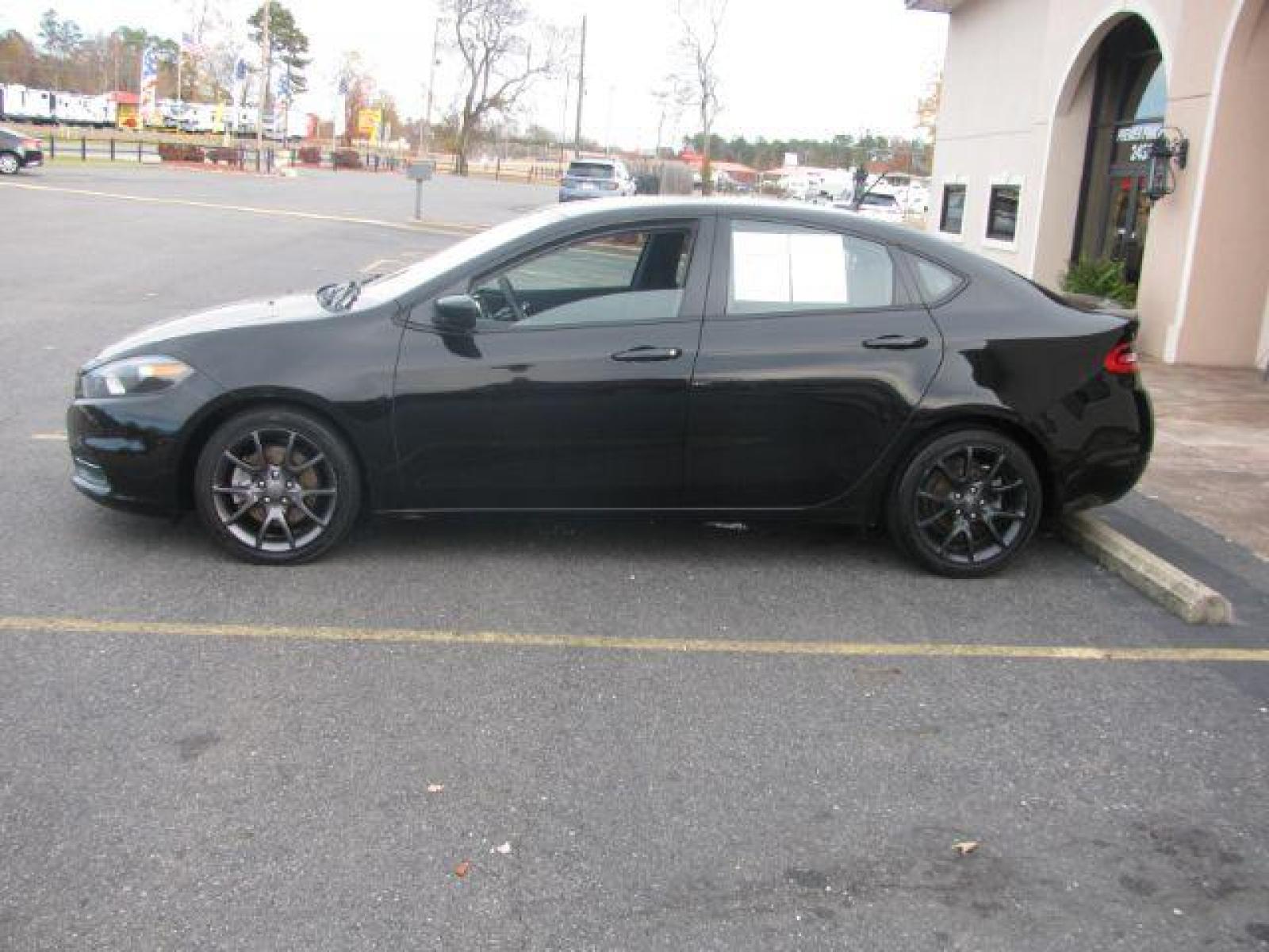 2015 Black Dodge Dart SEDAN 4-DR (1C3CDFAA5FD) with an 2.0L L4 DOHC 16V TURBO engine, located at 2443 Albert Pike, Hot Springs, AR, 71913, (501) 623-6255, 34.492222, -93.109993 - LISTED FEATURES MAY BE OPTIONAL AND NOT INCLUDED ON THIS VEHICLE!!! - Photo #1
