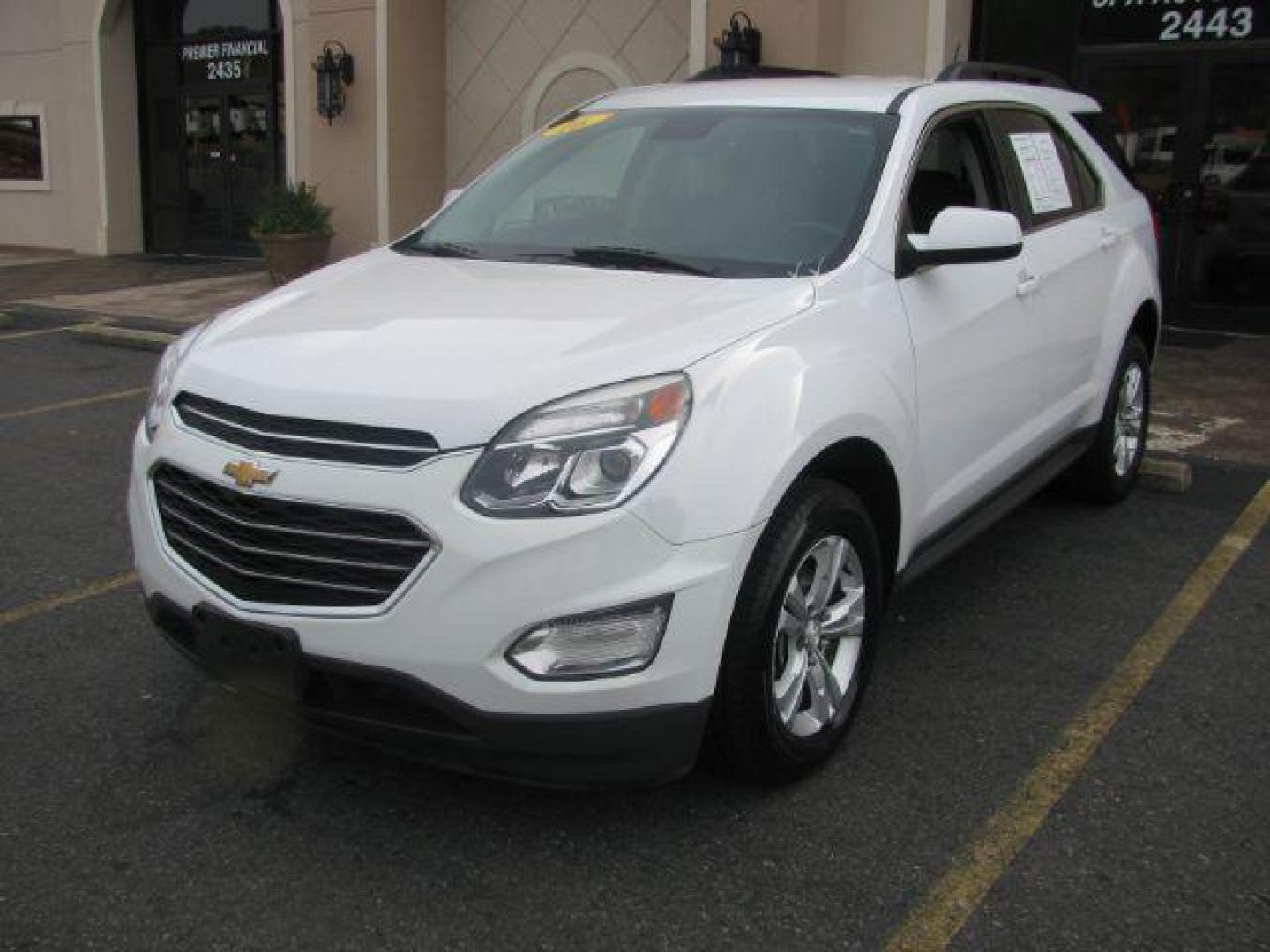 2016 White Chevrolet Equinox LT 2WD (2GNALCEKXG6) with an 2.4L L4 DOHC 16V FFV engine, 6-Speed Automatic transmission, located at 2443 Albert Pike, Hot Springs, AR, 71913, (501) 623-6255, 34.492222, -93.109993 - Photo#0