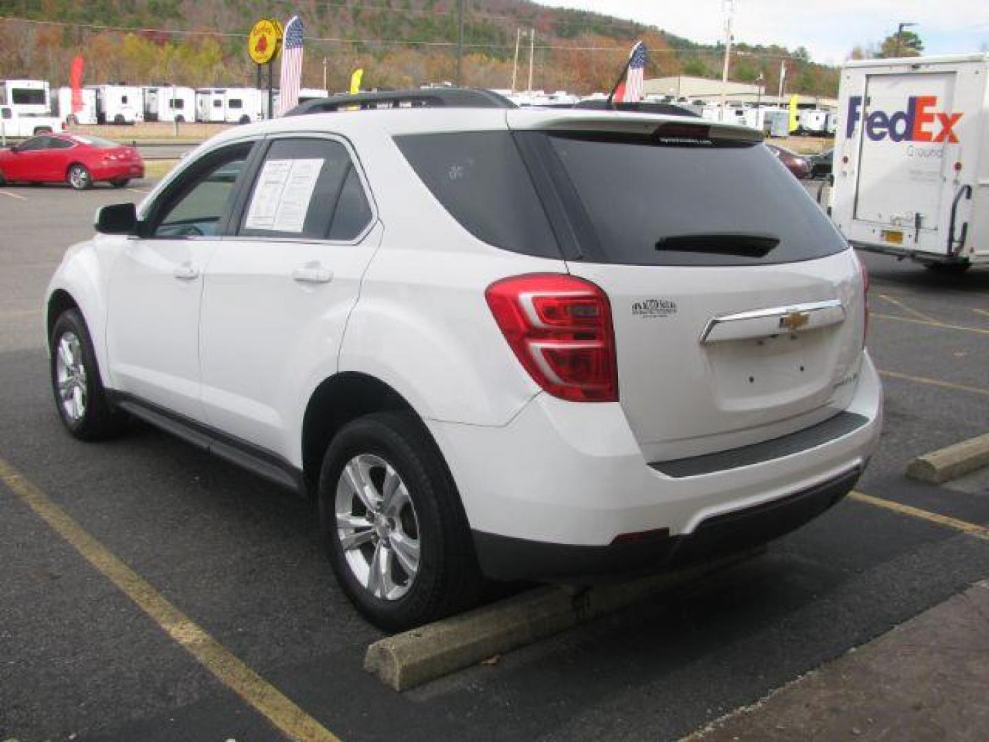 2016 White Chevrolet Equinox LT 2WD (2GNALCEKXG6) with an 2.4L L4 DOHC 16V FFV engine, 6-Speed Automatic transmission, located at 2443 Albert Pike, Hot Springs, AR, 71913, (501) 623-6255, 34.492222, -93.109993 - Photo#2