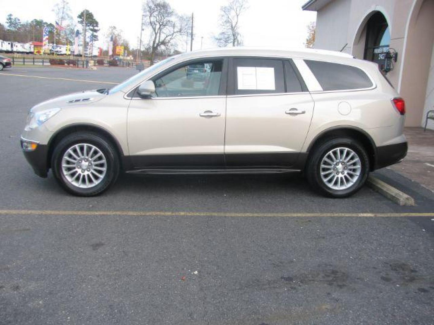 2012 Tan Buick Enclave Leather FWD (5GAKRCED0CJ) with an 3.6L V6 DOHC 24V engine, 6-Speed Automatic Overdrive transmission, located at 2443 Albert Pike, Hot Springs, AR, 71913, (501) 623-6255, 34.492222, -93.109993 - Photo#1