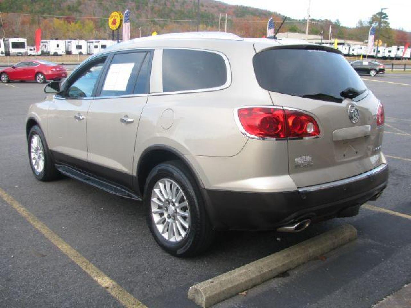 2012 Tan Buick Enclave Leather FWD (5GAKRCED0CJ) with an 3.6L V6 DOHC 24V engine, 6-Speed Automatic Overdrive transmission, located at 2443 Albert Pike, Hot Springs, AR, 71913, (501) 623-6255, 34.492222, -93.109993 - Photo#2