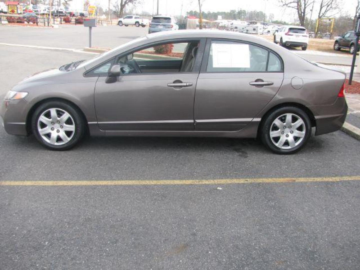 2010 Gray Honda Civic LX Sedan 5-Speed AT (2HGFA1F53AH) with an 1.8L L4 SOHC 16V engine, 5-Speed Automatic transmission, located at 2443 Albert Pike, Hot Springs, AR, 71913, (501) 623-6255, 34.492222, -93.109993 - Photo#1