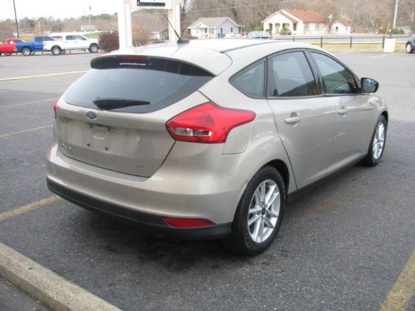 2016 Beige Ford Focus SE Hatch (1FADP3K25GL) with an 2.0L L4 DOHC 16V engine, located at 2443 Albert Pike, Hot Springs, AR, 71913, (501) 623-6255, 34.492222, -93.109993 - Photo#3