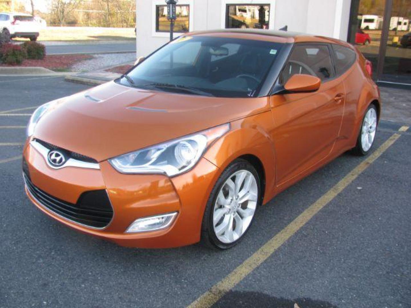 2013 Orange Hyundai Veloster Base (KMHTC6AD0DU) with an 1.6L L4 DOHC 16V engine, located at 2443 Albert Pike, Hot Springs, AR, 71913, (501) 623-6255, 34.492222, -93.109993 - Photo#0