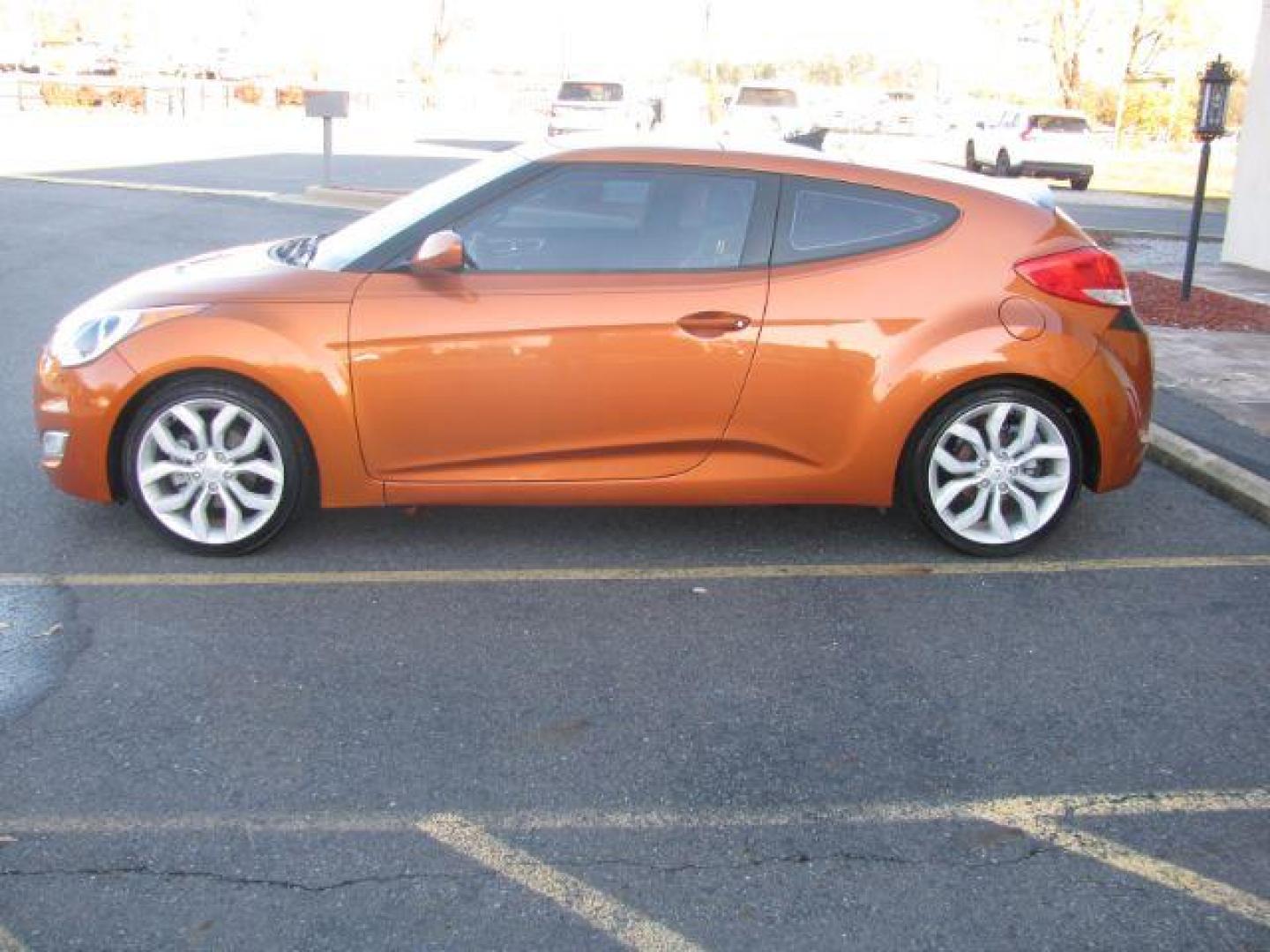 2013 Orange Hyundai Veloster Base (KMHTC6AD0DU) with an 1.6L L4 DOHC 16V engine, located at 2443 Albert Pike, Hot Springs, AR, 71913, (501) 623-6255, 34.492222, -93.109993 - Photo#1