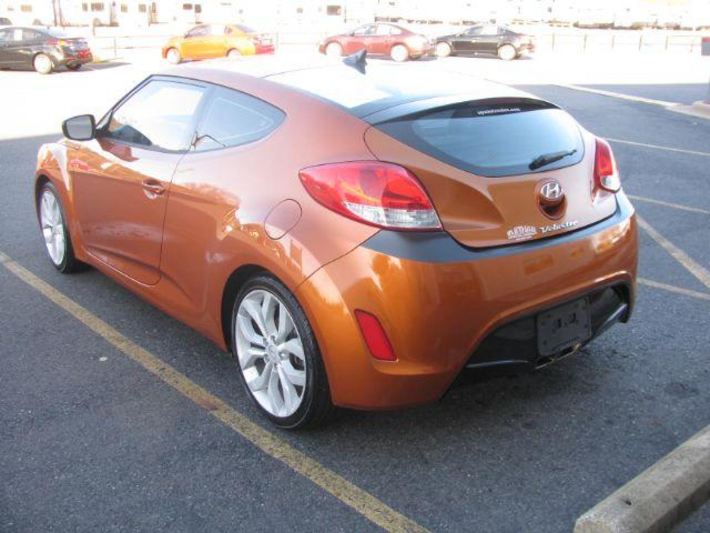 2013 Orange Hyundai Veloster Base (KMHTC6AD0DU) with an 1.6L L4 DOHC 16V engine, located at 2443 Albert Pike, Hot Springs, AR, 71913, (501) 623-6255, 34.492222, -93.109993 - Photo#2