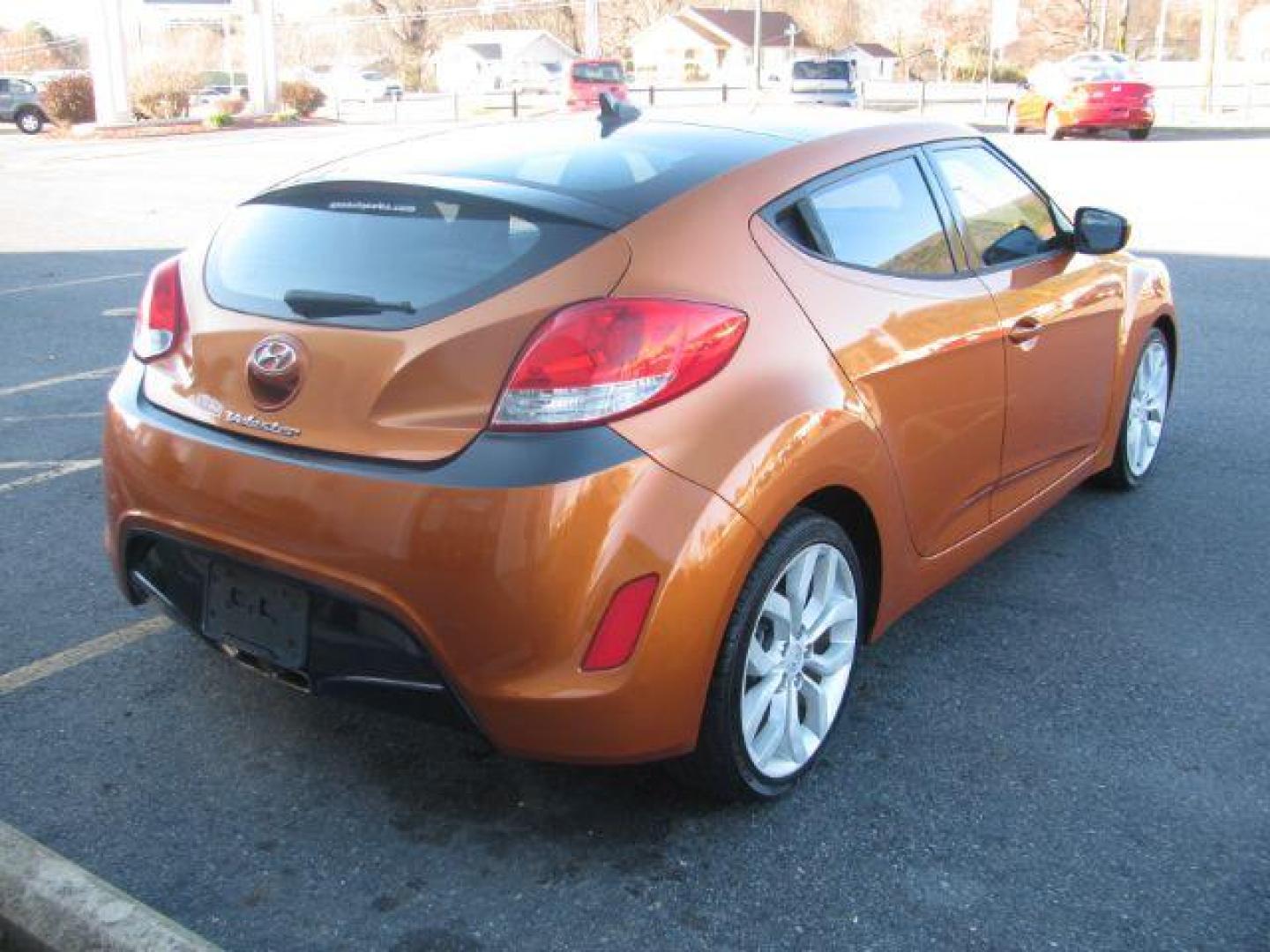 2013 Orange Hyundai Veloster Base (KMHTC6AD0DU) with an 1.6L L4 DOHC 16V engine, located at 2443 Albert Pike, Hot Springs, AR, 71913, (501) 623-6255, 34.492222, -93.109993 - Photo#3