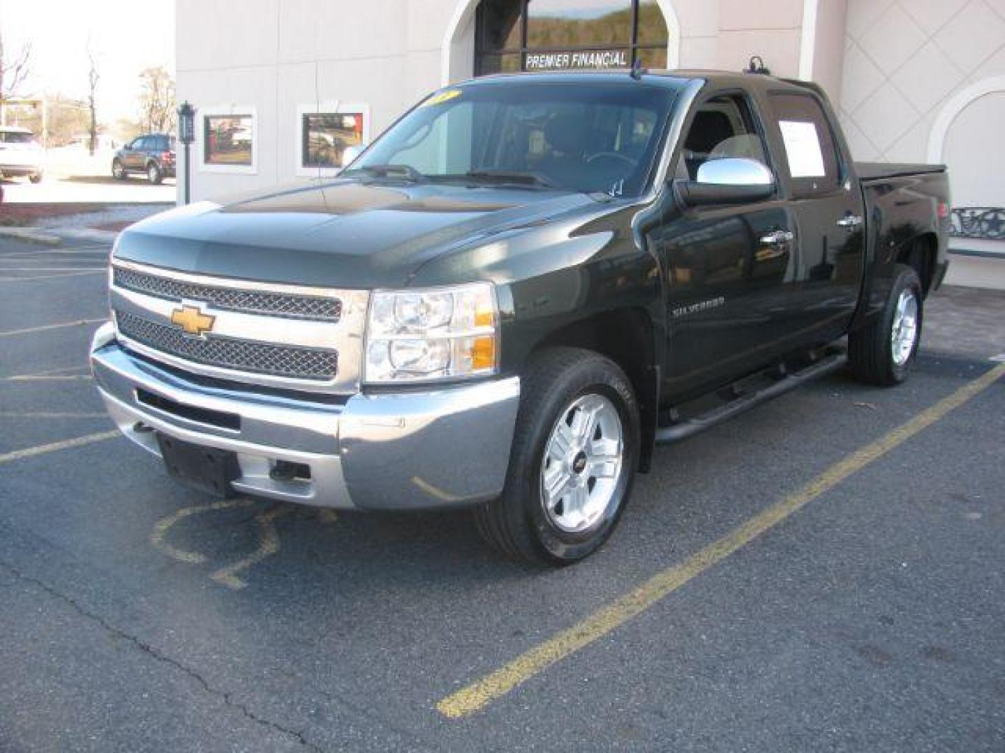 2013 Green Chevrolet Silverado 1500 LT Crew Cab 4WD (3GCPKSE70DG) with an 5.3L V8 OHV 16V FFV engine, located at 2443 Albert Pike, Hot Springs, AR, 71913, (501) 623-6255, 34.492222, -93.109993 - Photo#0