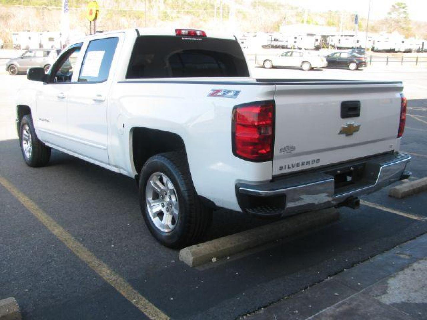 2015 White Chevrolet Silverado 1500 LT Crew Cab 4WD (3GCUKREC7FG) with an 5.3L V8 OHV 16V engine, 6-Speed Automatic transmission, located at 2443 Albert Pike, Hot Springs, AR, 71913, (501) 623-6255, 34.492222, -93.109993 - Photo#2