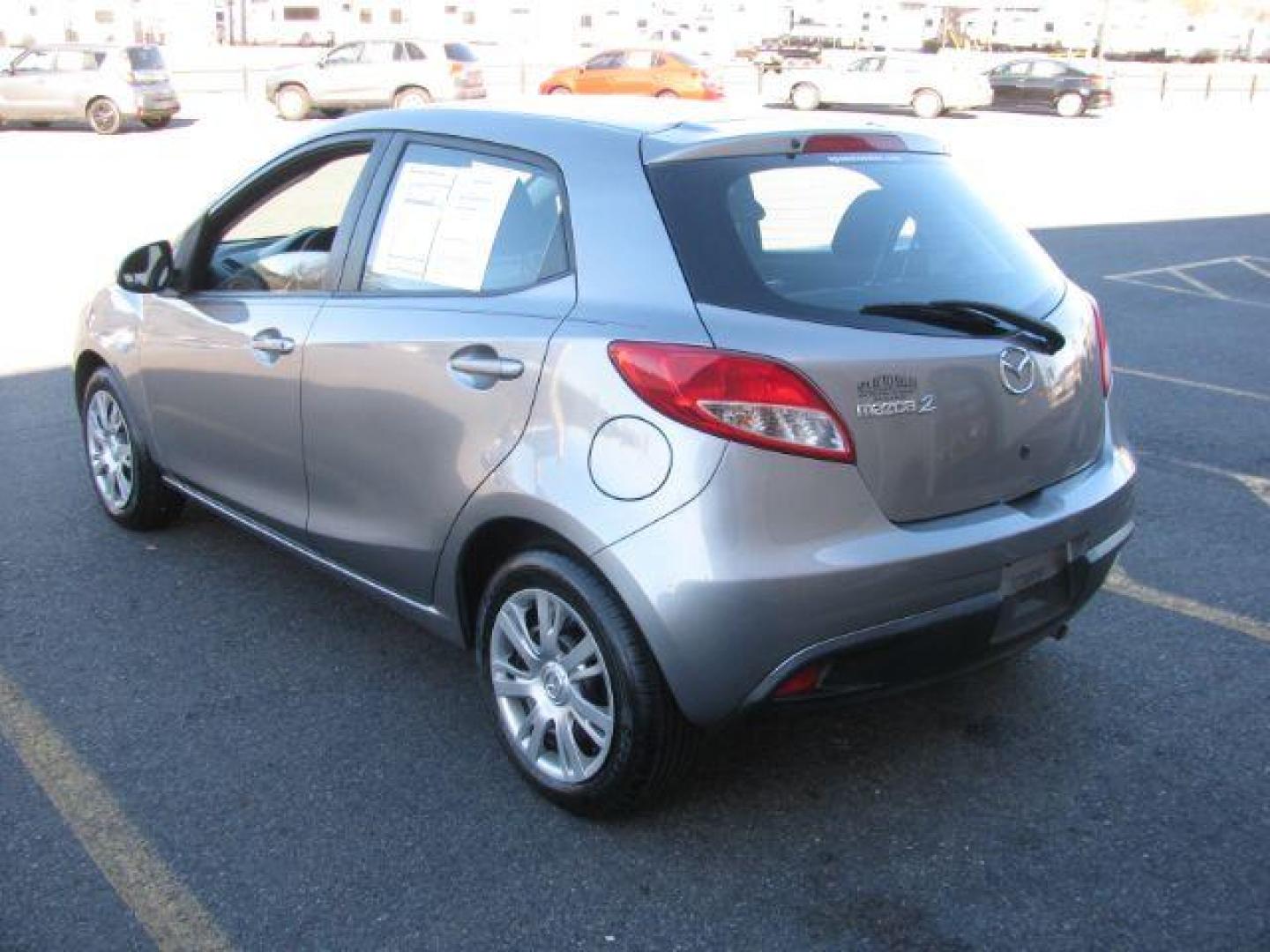 2014 Gray Mazda MAZDA2 Sport AT (JM1DE1KY8E0) with an 1.5L L4 DOHC 16V engine, 4-Speed Automatic transmission, located at 2443 Albert Pike, Hot Springs, AR, 71913, (501) 623-6255, 34.492222, -93.109993 - LISTED FEATURES MAY BE OPTIONAL AND NOT INCLUDED ON THIS VEHICLE!!! - Photo#2