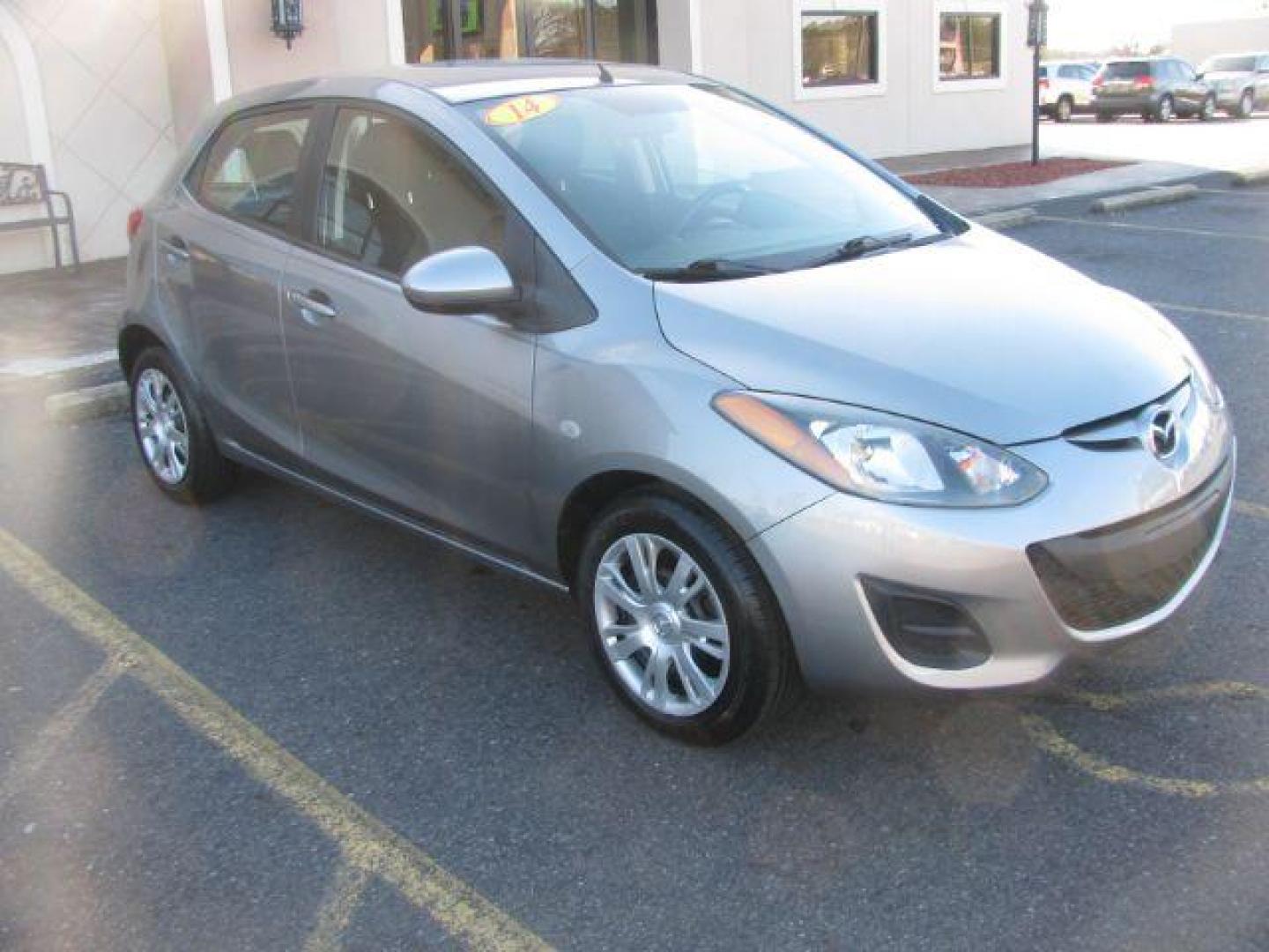 2014 Gray Mazda MAZDA2 Sport AT (JM1DE1KY8E0) with an 1.5L L4 DOHC 16V engine, 4-Speed Automatic transmission, located at 2443 Albert Pike, Hot Springs, AR, 71913, (501) 623-6255, 34.492222, -93.109993 - LISTED FEATURES MAY BE OPTIONAL AND NOT INCLUDED ON THIS VEHICLE!!! - Photo#5