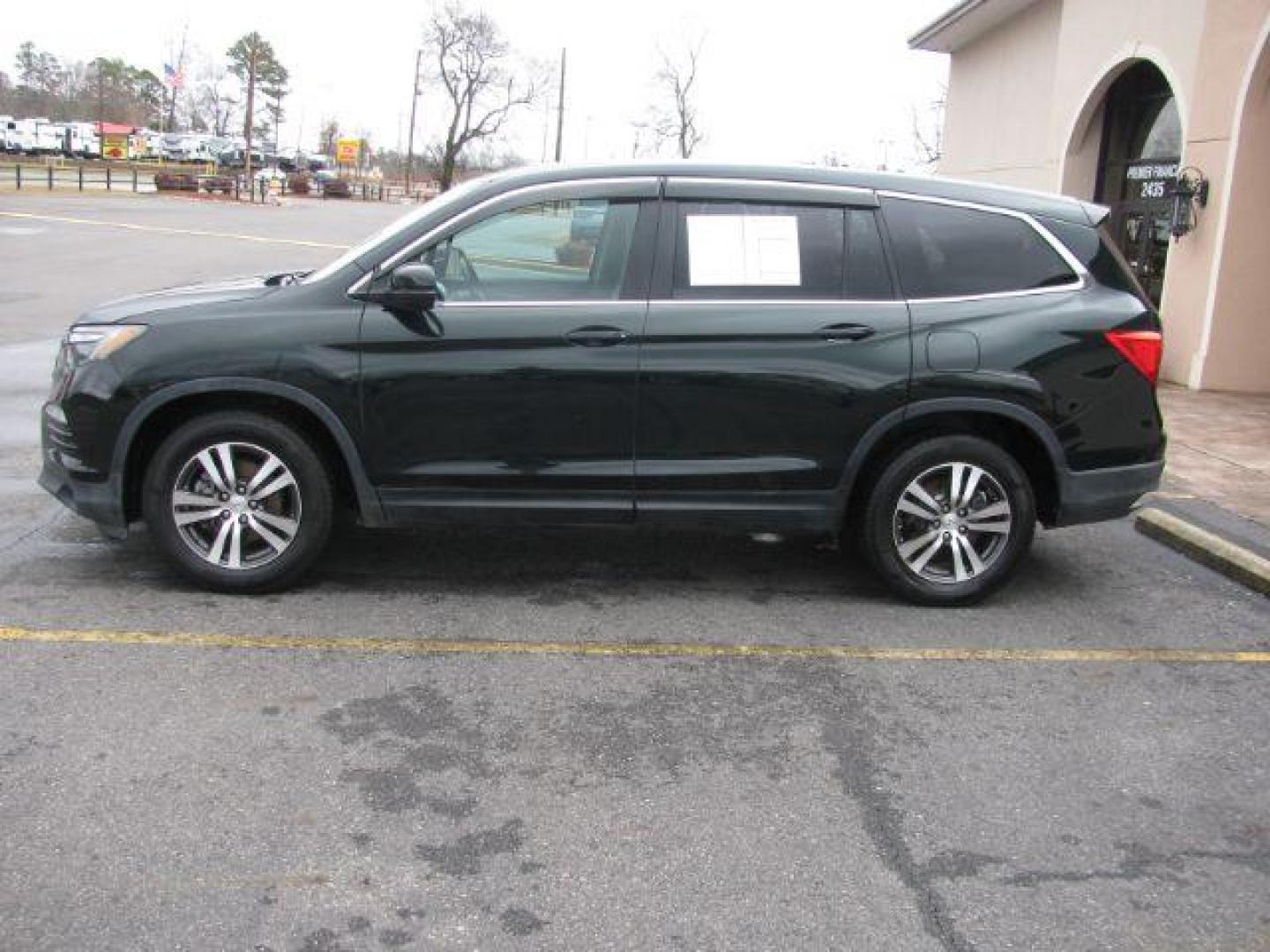 2016 Green Honda Pilot EXL 2WD (5FNYF5H59GB) with an 3.5L V6 SOHC 24V engine, 6-Speed Automatic transmission, located at 2443 Albert Pike, Hot Springs, AR, 71913, (501) 623-6255, 34.492222, -93.109993 - LISTED FEATURES MAY BE OPTIONAL AND NOT INCLUDED ON THIS VEHICLE!!! - Photo#1