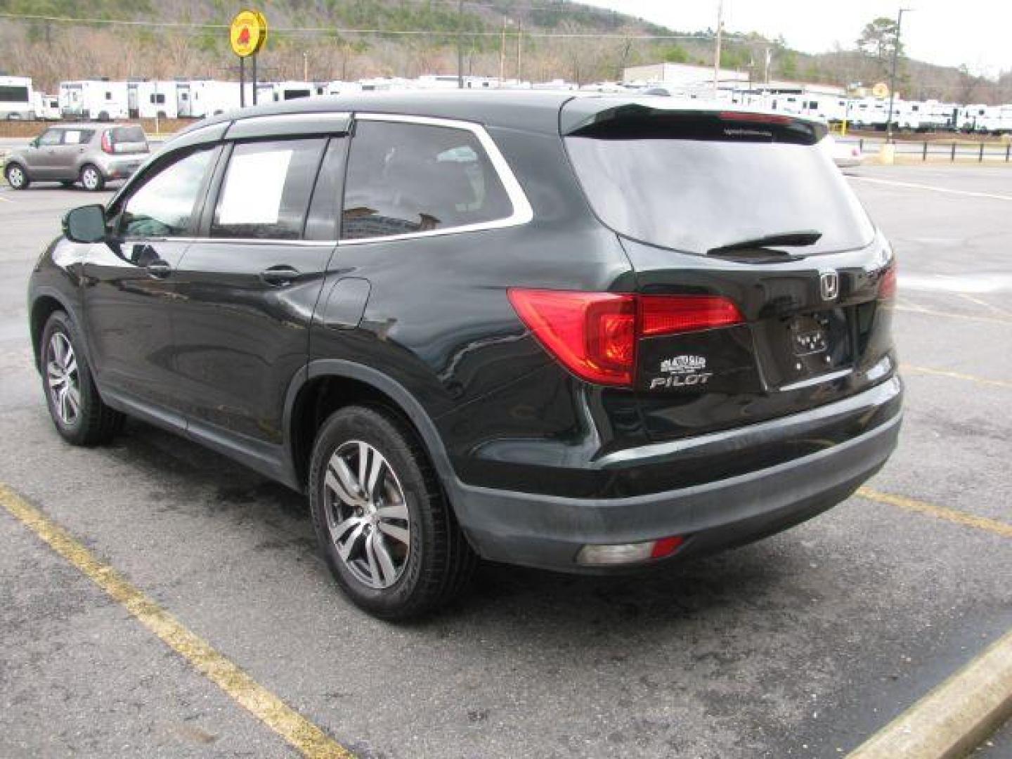 2016 Green Honda Pilot EXL 2WD (5FNYF5H59GB) with an 3.5L V6 SOHC 24V engine, 6-Speed Automatic transmission, located at 2443 Albert Pike, Hot Springs, AR, 71913, (501) 623-6255, 34.492222, -93.109993 - LISTED FEATURES MAY BE OPTIONAL AND NOT INCLUDED ON THIS VEHICLE!!! - Photo#2