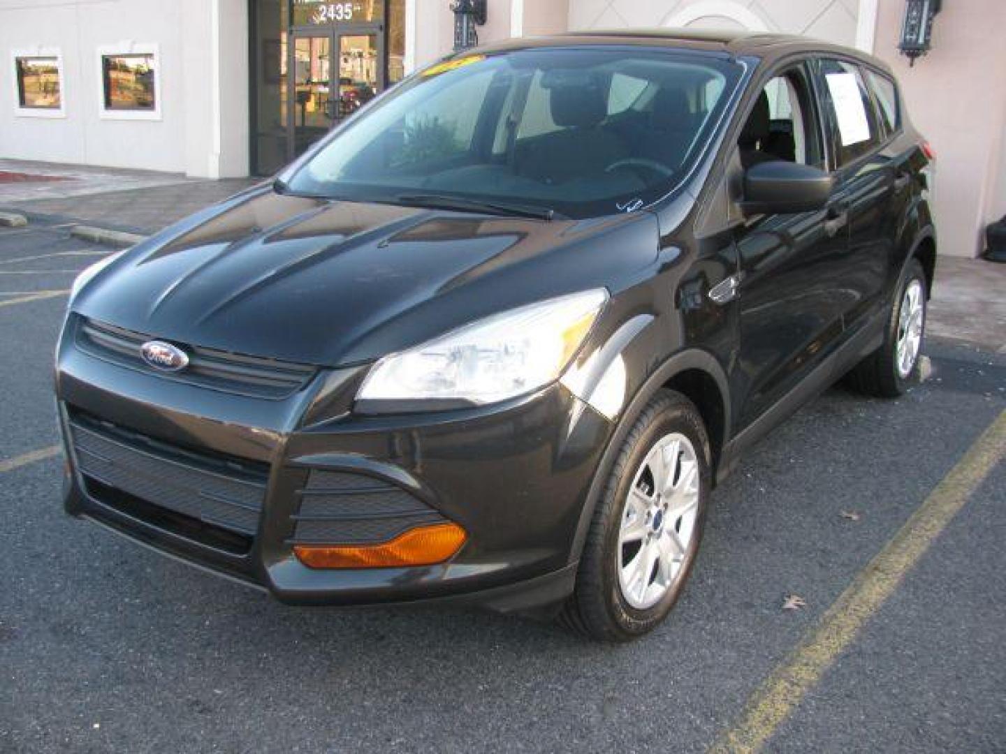 2013 Black Ford Escape S FWD (1FMCU0F7XDU) with an 2.5L L4 DOHC 16V engine, 6-Speed Automatic transmission, located at 2443 Albert Pike, Hot Springs, AR, 71913, (501) 623-6255, 34.492222, -93.109993 - Photo#0