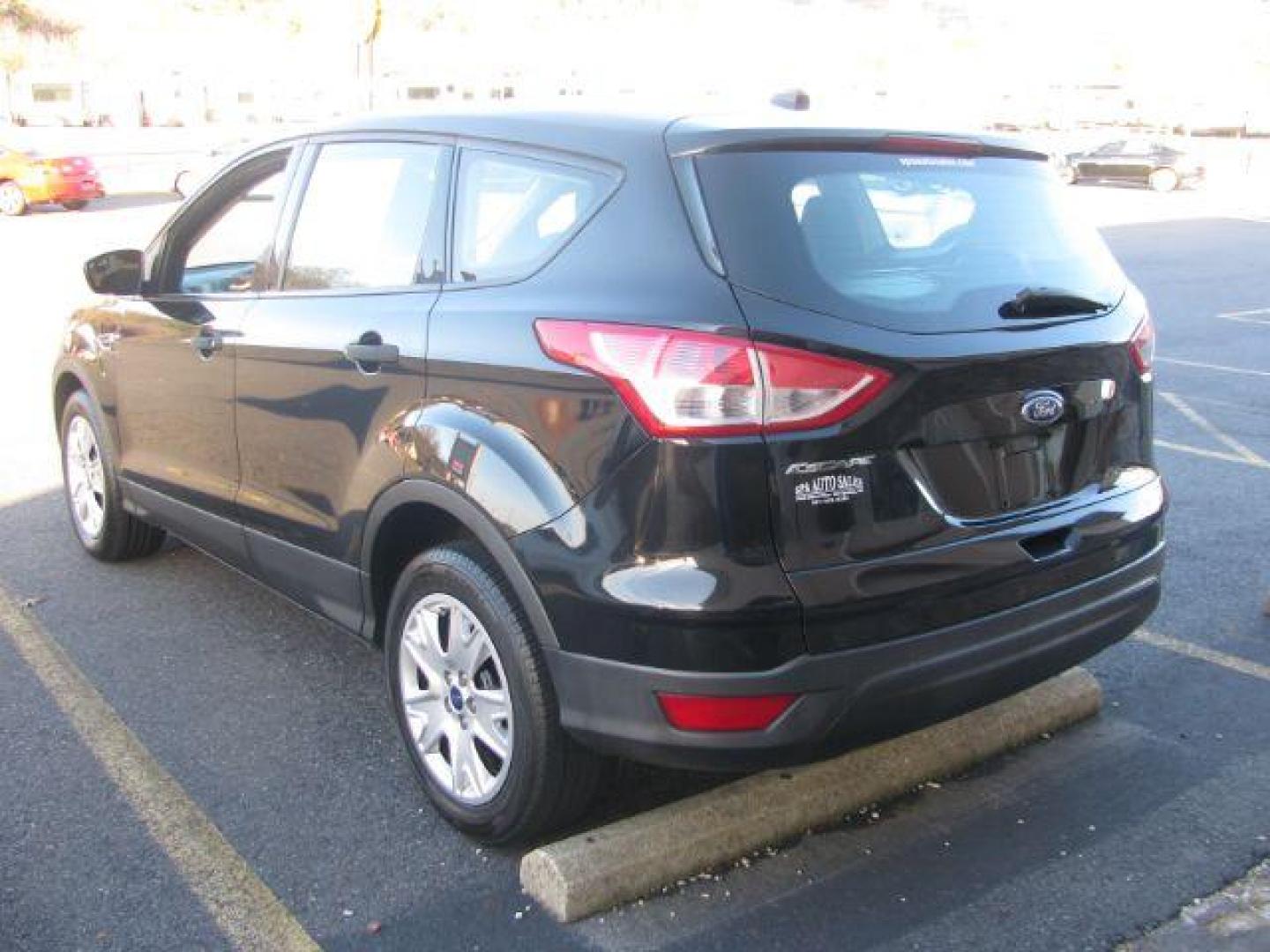 2013 Black Ford Escape S FWD (1FMCU0F7XDU) with an 2.5L L4 DOHC 16V engine, 6-Speed Automatic transmission, located at 2443 Albert Pike, Hot Springs, AR, 71913, (501) 623-6255, 34.492222, -93.109993 - Photo#2