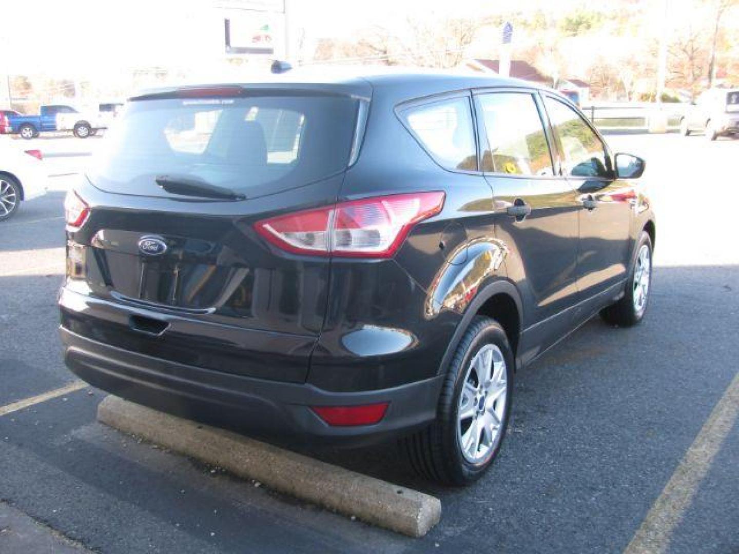 2013 Black Ford Escape S FWD (1FMCU0F7XDU) with an 2.5L L4 DOHC 16V engine, 6-Speed Automatic transmission, located at 2443 Albert Pike, Hot Springs, AR, 71913, (501) 623-6255, 34.492222, -93.109993 - Photo#3