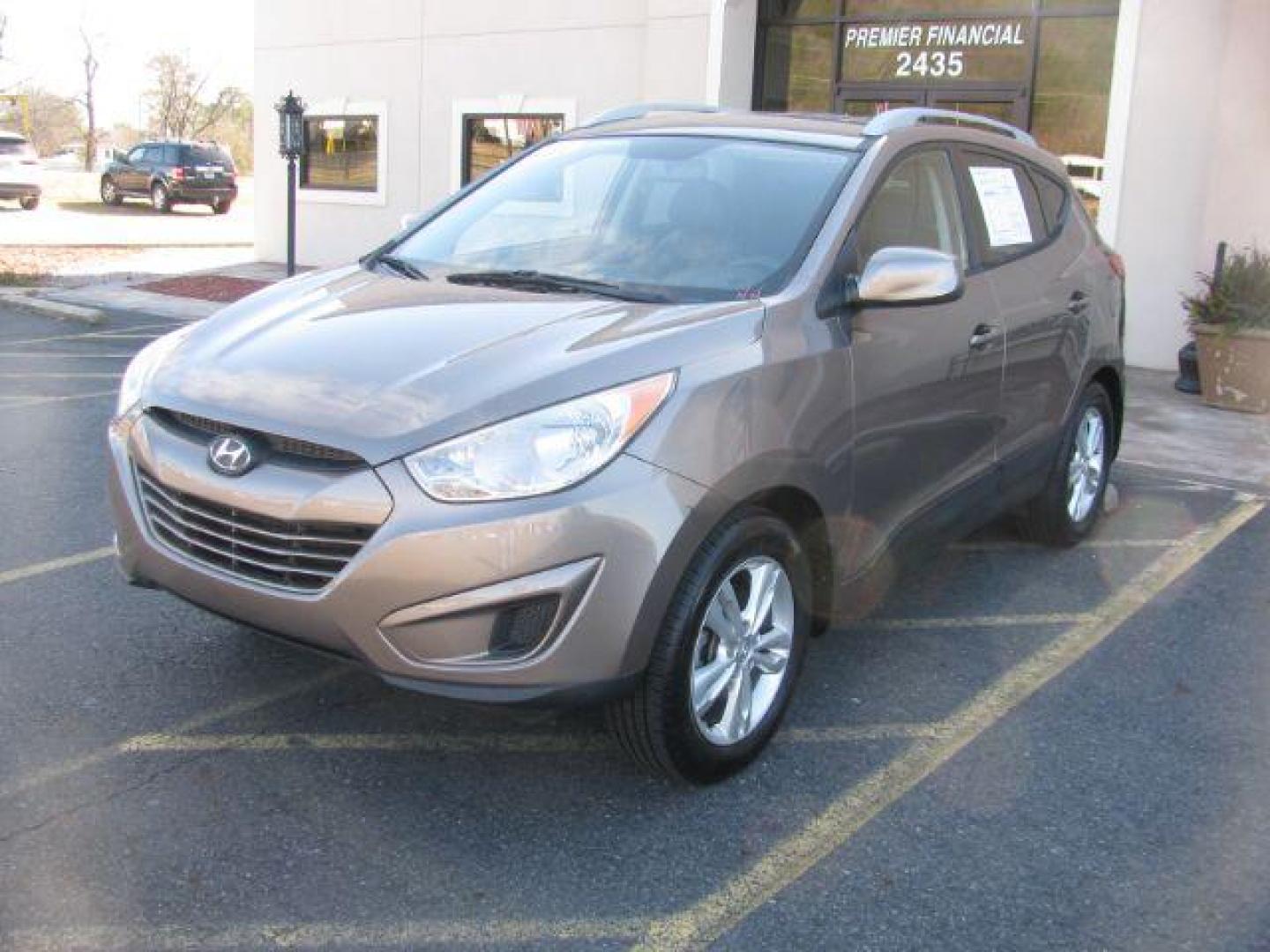 2011 Gray Hyundai Tucson Limited Auto AWD (KM8JUCAC2BU) with an 2.4L L4 DOHC 16V engine, 6-Speed Automatic transmission, located at 2443 Albert Pike, Hot Springs, AR, 71913, (501) 623-6255, 34.492222, -93.109993 - Photo#0