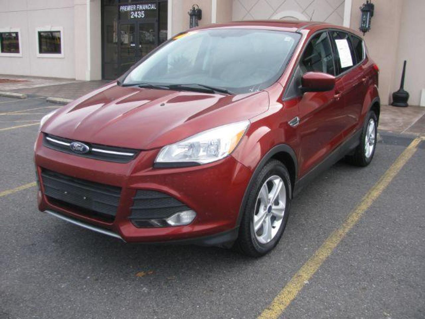 2016 Maroon Ford Escape SE FWD (1FMCU0G71GU) with an 2.5L L4 DOHC 16V engine, 6-Speed Automatic transmission, located at 2443 Albert Pike, Hot Springs, AR, 71913, (501) 623-6255, 34.492222, -93.109993 - Photo#0