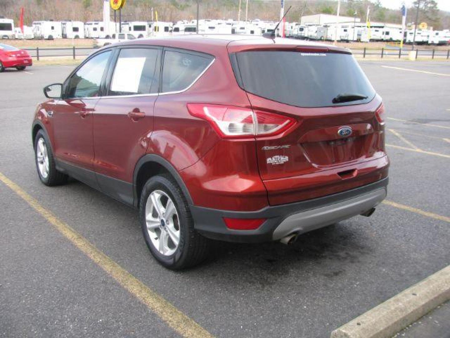 2016 Maroon Ford Escape SE FWD (1FMCU0G71GU) with an 2.5L L4 DOHC 16V engine, 6-Speed Automatic transmission, located at 2443 Albert Pike, Hot Springs, AR, 71913, (501) 623-6255, 34.492222, -93.109993 - Photo#2