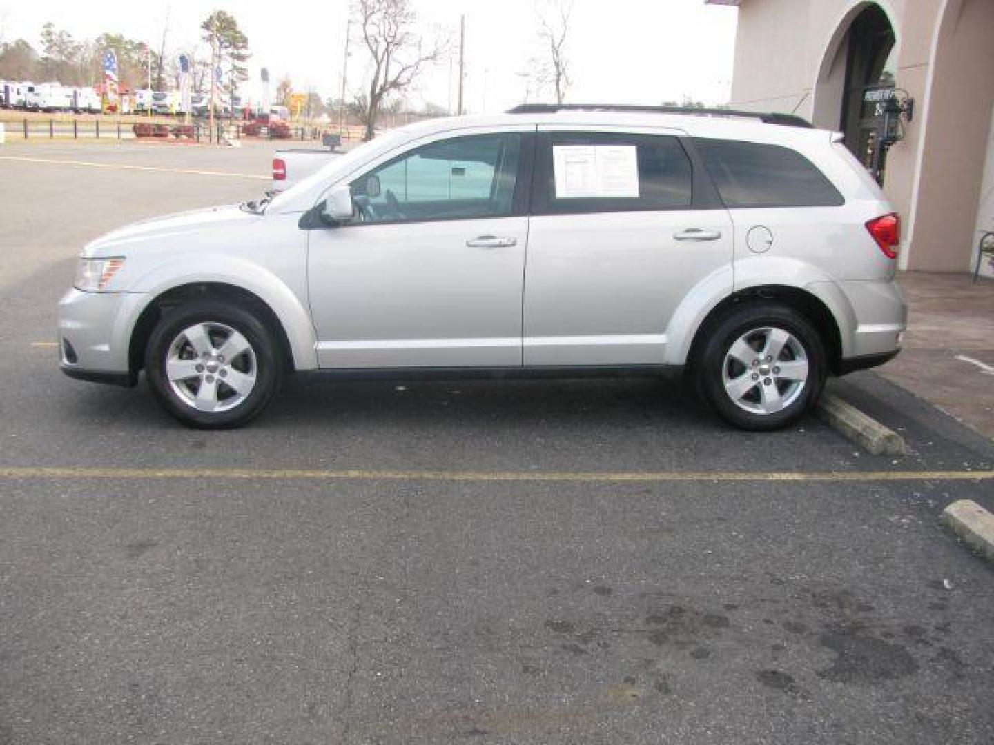 2012 Silver Dodge Journey SXT (3C4PDCBG7CT) with an 3.6L V6 DOHC 24V engine, 6-Speed Automatic transmission, located at 2443 Albert Pike, Hot Springs, AR, 71913, (501) 623-6255, 34.492222, -93.109993 - Photo#1