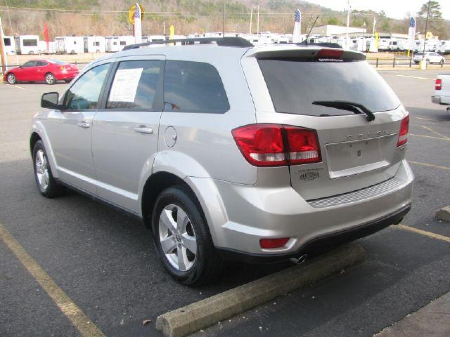 2012 Silver Dodge Journey SXT (3C4PDCBG7CT) with an 3.6L V6 DOHC 24V engine, 6-Speed Automatic transmission, located at 2443 Albert Pike, Hot Springs, AR, 71913, (501) 623-6255, 34.492222, -93.109993 - Photo#2