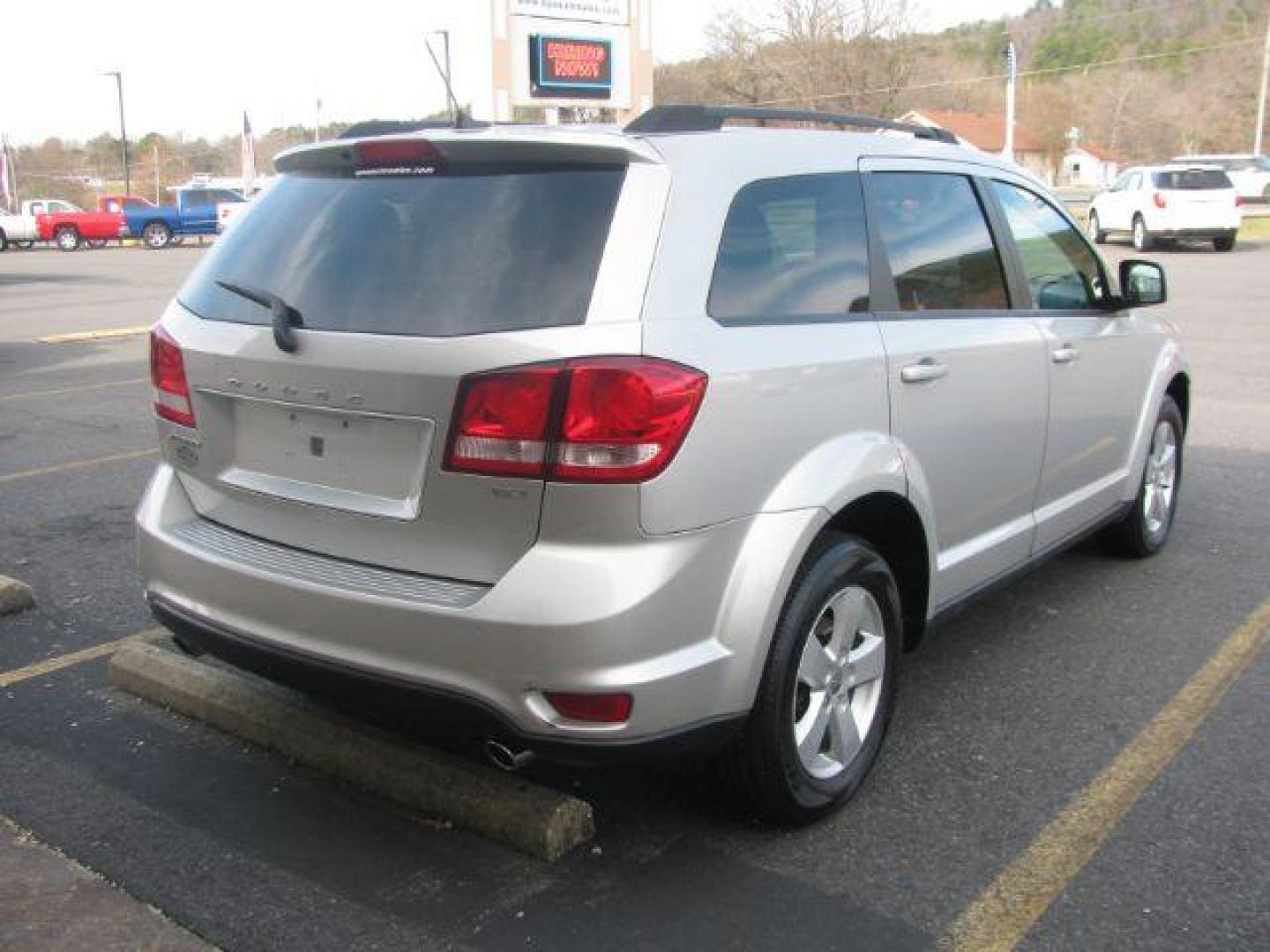 2012 Silver Dodge Journey SXT (3C4PDCBG7CT) with an 3.6L V6 DOHC 24V engine, 6-Speed Automatic transmission, located at 2443 Albert Pike, Hot Springs, AR, 71913, (501) 623-6255, 34.492222, -93.109993 - Photo#3