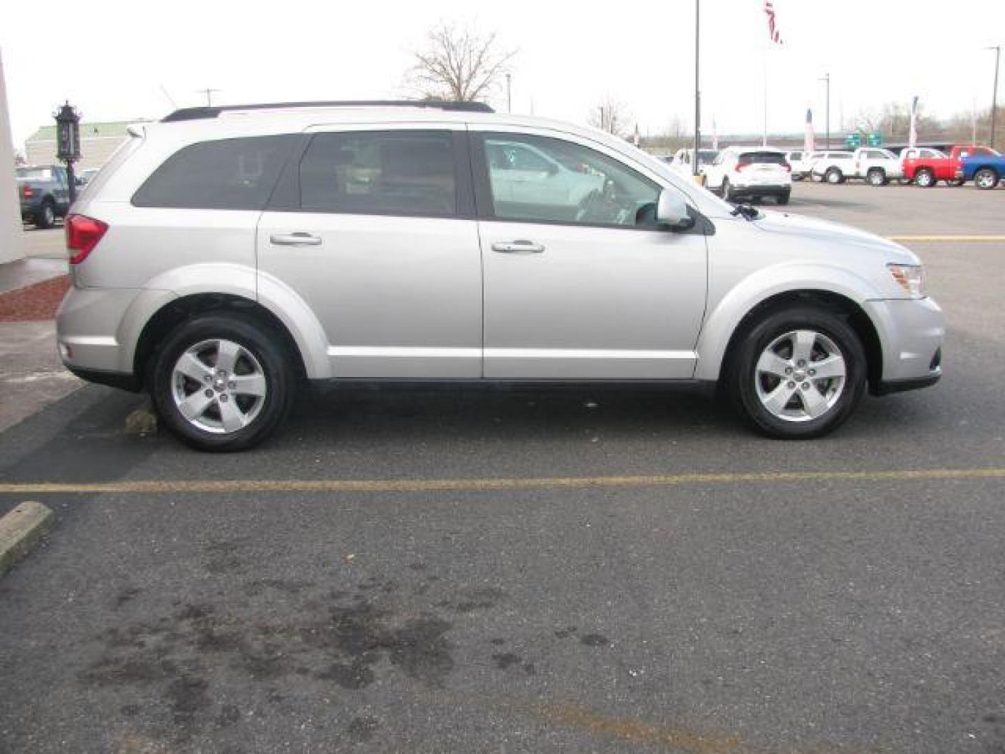 2012 Silver Dodge Journey SXT (3C4PDCBG7CT) with an 3.6L V6 DOHC 24V engine, 6-Speed Automatic transmission, located at 2443 Albert Pike, Hot Springs, AR, 71913, (501) 623-6255, 34.492222, -93.109993 - Photo#4