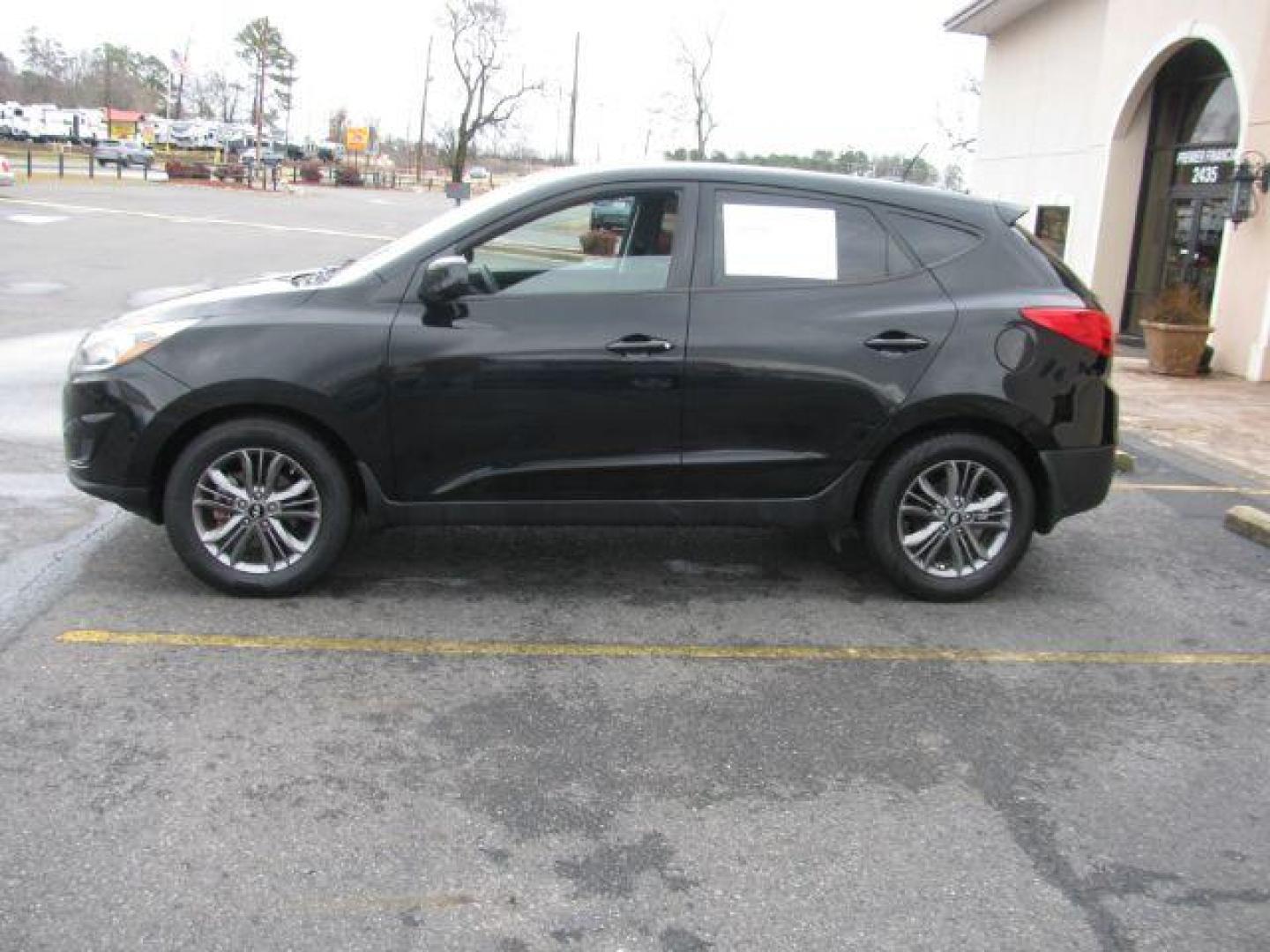 2015 Black Hyundai Tucson GLS FWD (KM8JT3AF3FU) with an 2.0L L4 DOHC 16V engine, 6-Speed Automatic transmission, located at 2443 Albert Pike, Hot Springs, AR, 71913, (501) 623-6255, 34.492222, -93.109993 - Photo#1