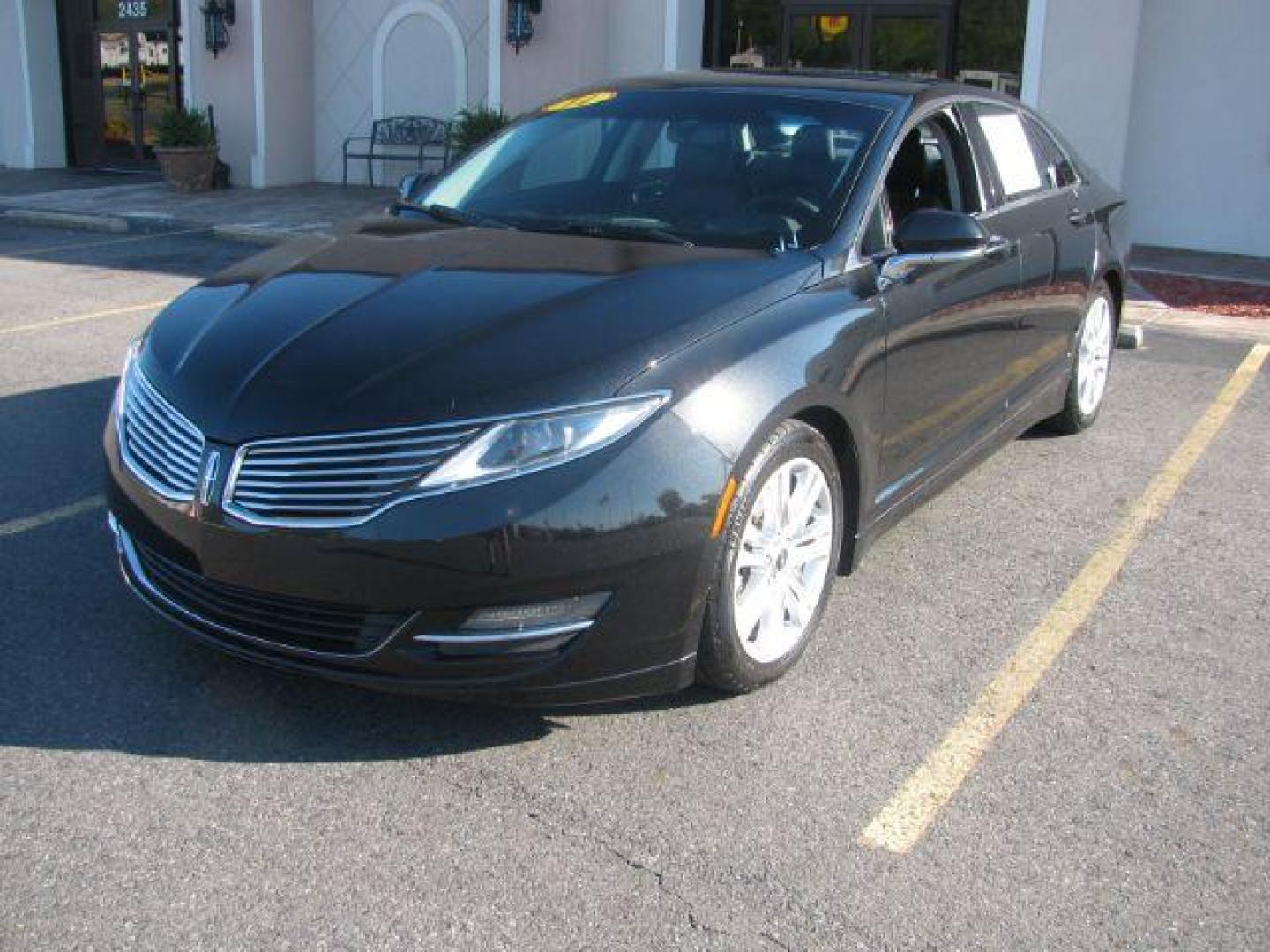 2014 Black Lincoln MKZ FWD (3LN6L2GK8ER) with an 3.7L V6 DOHC 24V engine, 6-Speed Automatic transmission, located at 2443 Albert Pike, Hot Springs, AR, 71913, (501) 623-6255, 34.492222, -93.109993 - Photo#0