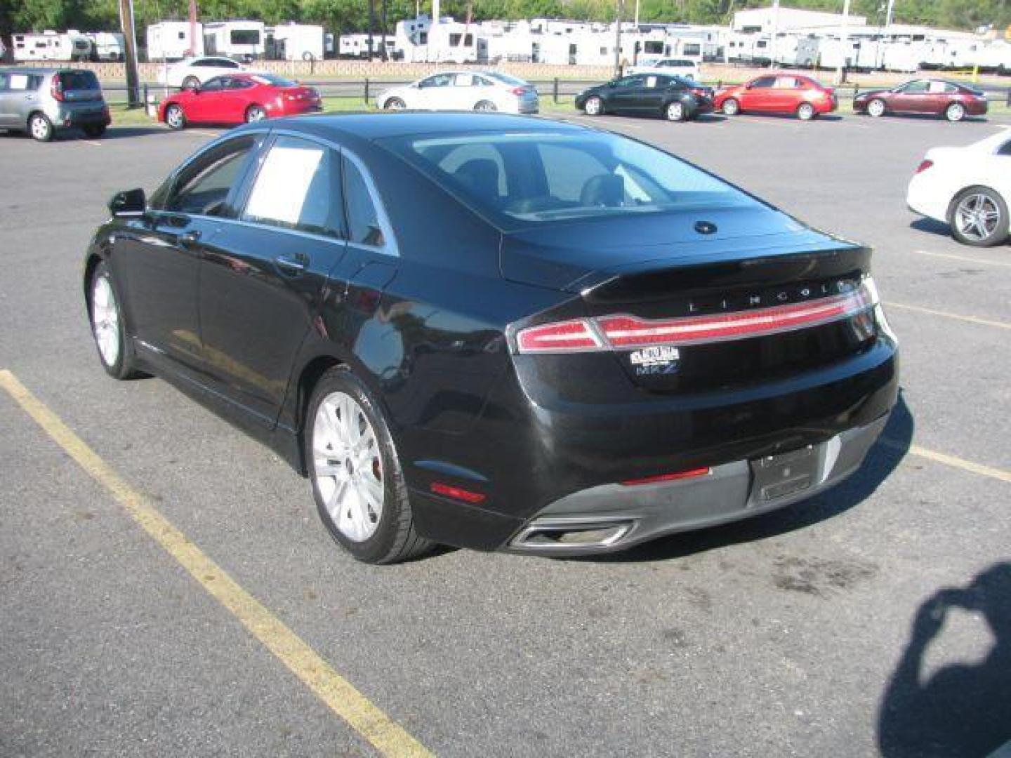 2014 Black Lincoln MKZ FWD (3LN6L2GK8ER) with an 3.7L V6 DOHC 24V engine, 6-Speed Automatic transmission, located at 2443 Albert Pike, Hot Springs, AR, 71913, (501) 623-6255, 34.492222, -93.109993 - Photo#2