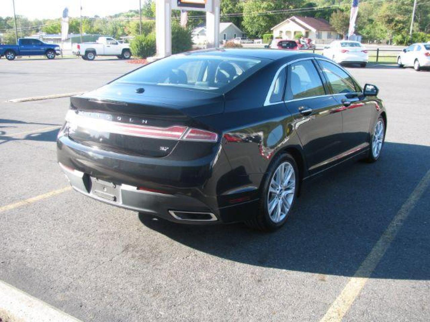 2014 Black Lincoln MKZ FWD (3LN6L2GK8ER) with an 3.7L V6 DOHC 24V engine, 6-Speed Automatic transmission, located at 2443 Albert Pike, Hot Springs, AR, 71913, (501) 623-6255, 34.492222, -93.109993 - Photo#3