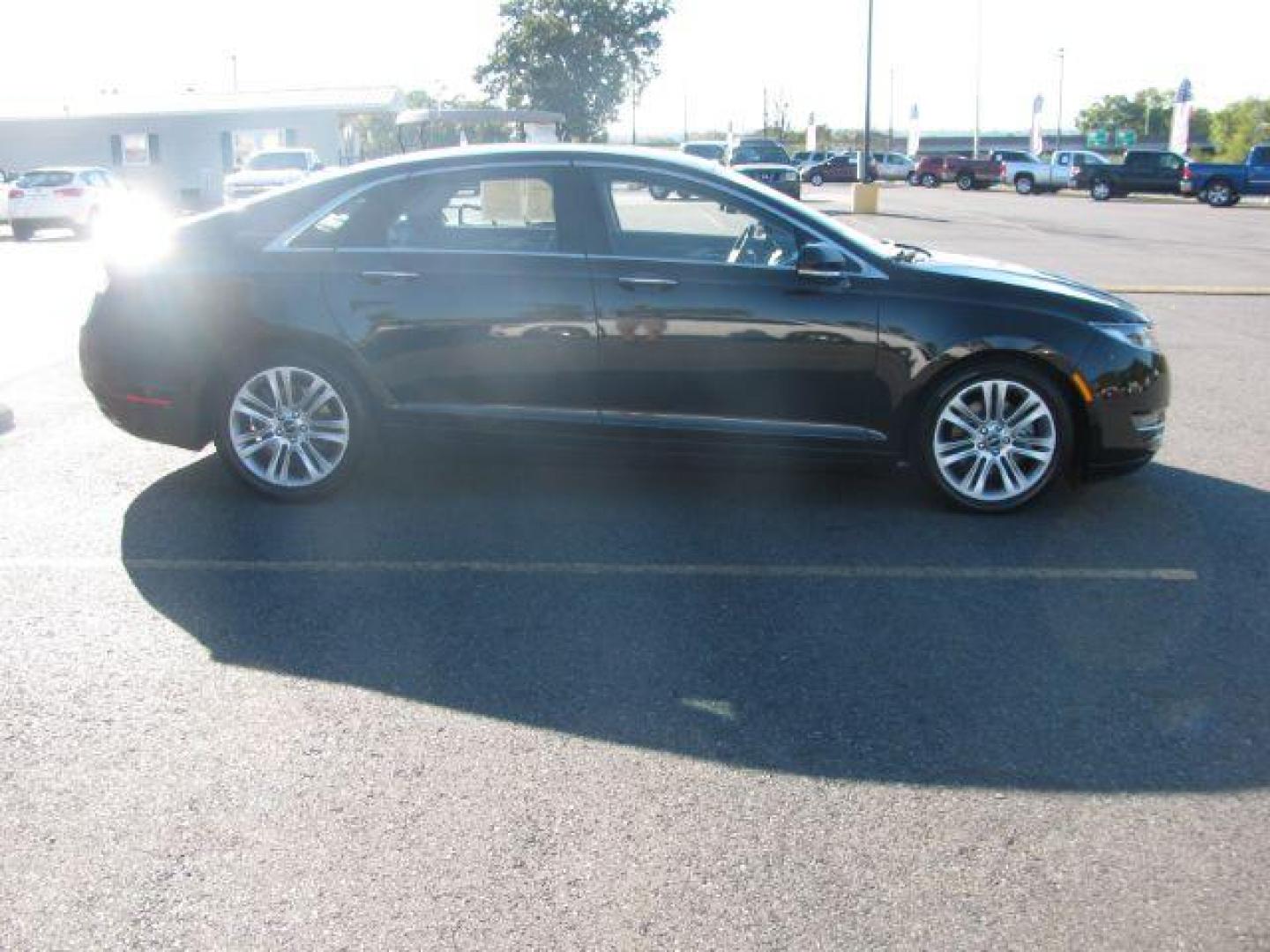 2014 Black Lincoln MKZ FWD (3LN6L2GK8ER) with an 3.7L V6 DOHC 24V engine, 6-Speed Automatic transmission, located at 2443 Albert Pike, Hot Springs, AR, 71913, (501) 623-6255, 34.492222, -93.109993 - Photo#4