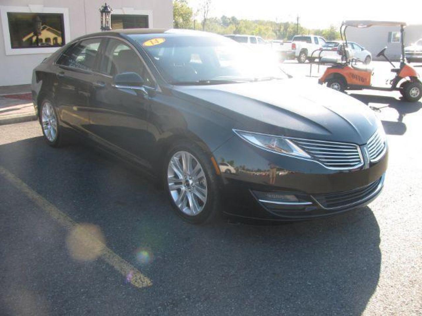 2014 Black Lincoln MKZ FWD (3LN6L2GK8ER) with an 3.7L V6 DOHC 24V engine, 6-Speed Automatic transmission, located at 2443 Albert Pike, Hot Springs, AR, 71913, (501) 623-6255, 34.492222, -93.109993 - Photo#5