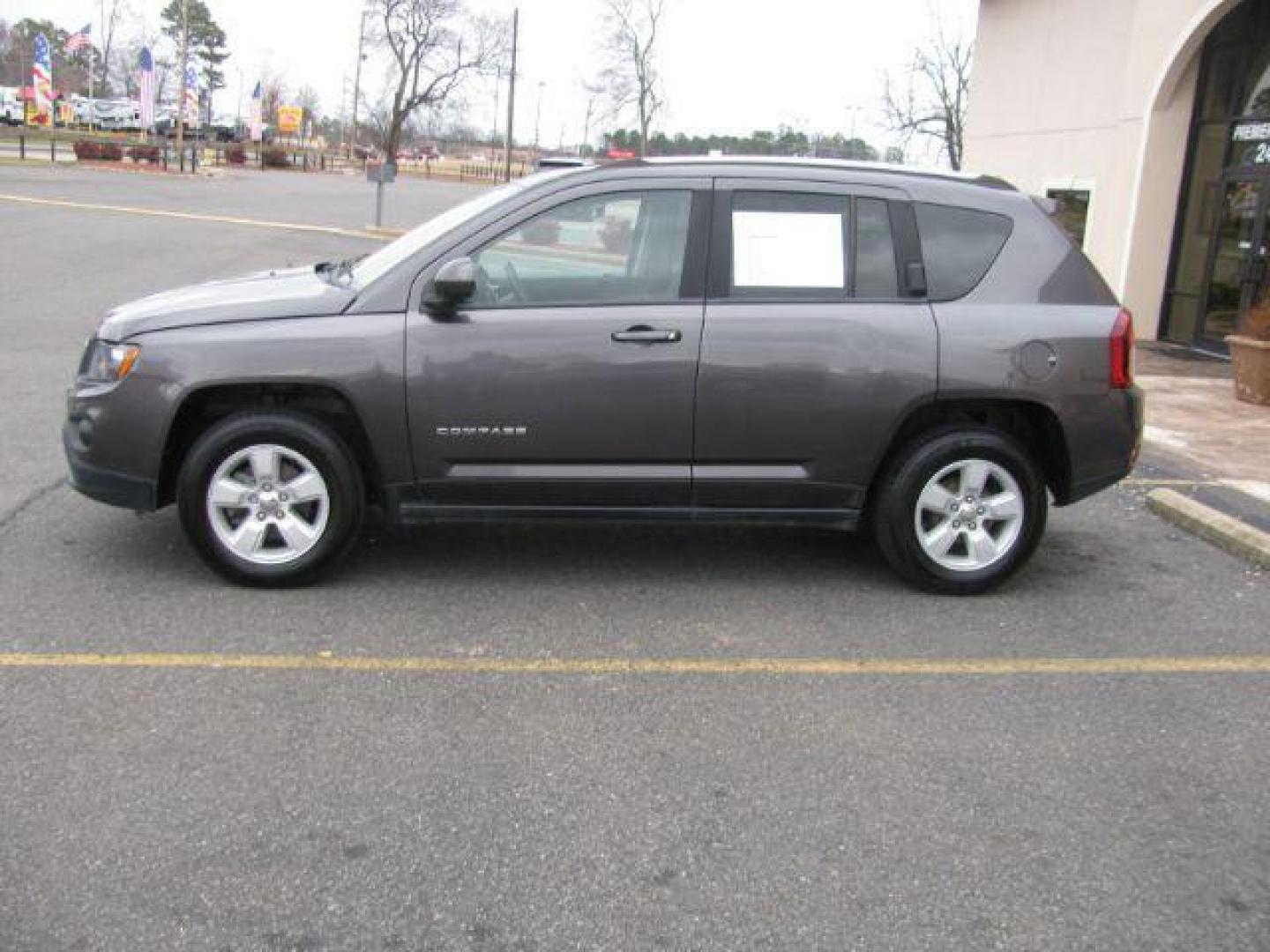 2016 Gray Jeep Compass Latitude FWD (1C4NJCEA1GD) with an 2.0L L4 DOHC 16V engine, Continuously Variable Transmission transmission, located at 2443 Albert Pike, Hot Springs, AR, 71913, (501) 623-6255, 34.492222, -93.109993 - Photo#1