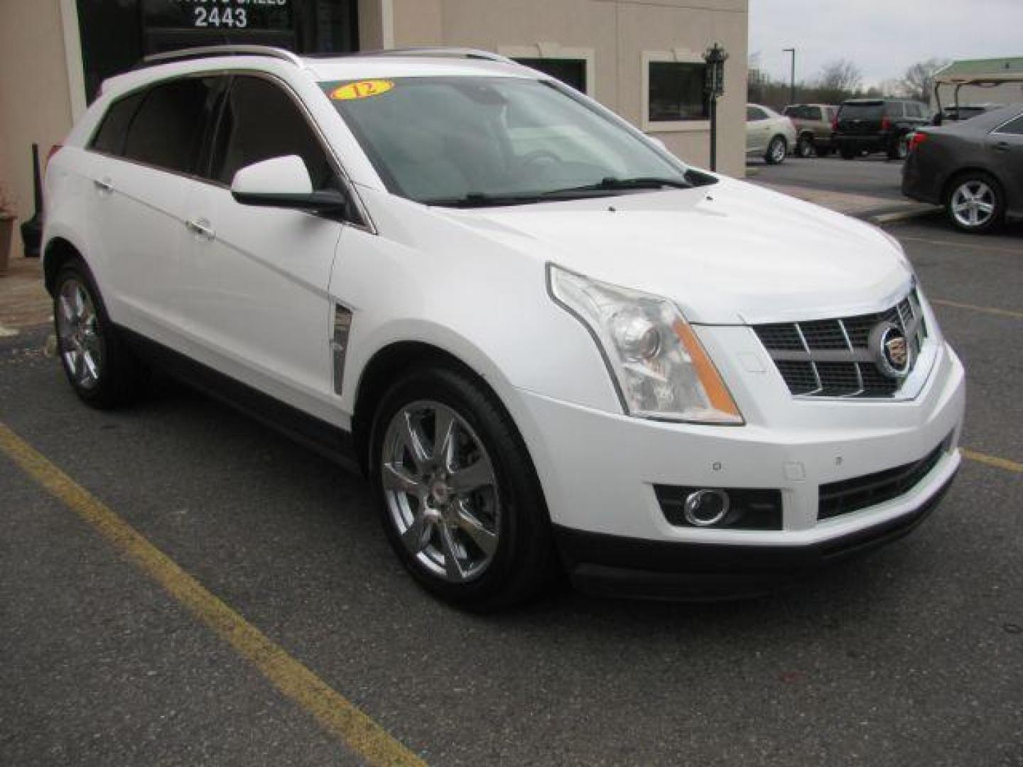 2012 White Cadillac SRX Performance (3GYFNBE32CS) with an 3.6L V6 DOHC 24V FFV engine, 6-Speed Automatic transmission, located at 2443 Albert Pike, Hot Springs, AR, 71913, (501) 623-6255, 34.492222, -93.109993 - Photo#5