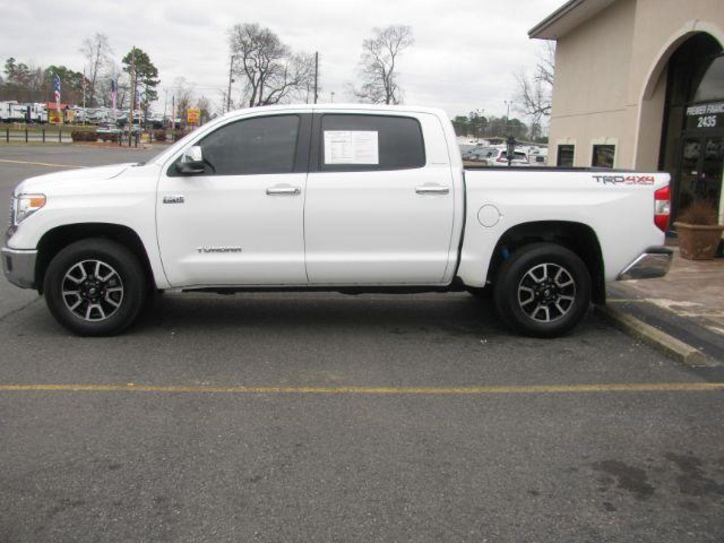 2014 White Toyota Tundra Limited 5.7L FFV CrewMax 4WD (5TFHW5F13EX) with an 5.7L V8 DOHC 32V FFV engine, 6-Speed Automatic transmission, located at 2443 Albert Pike, Hot Springs, AR, 71913, (501) 623-6255, 34.492222, -93.109993 - Photo#1