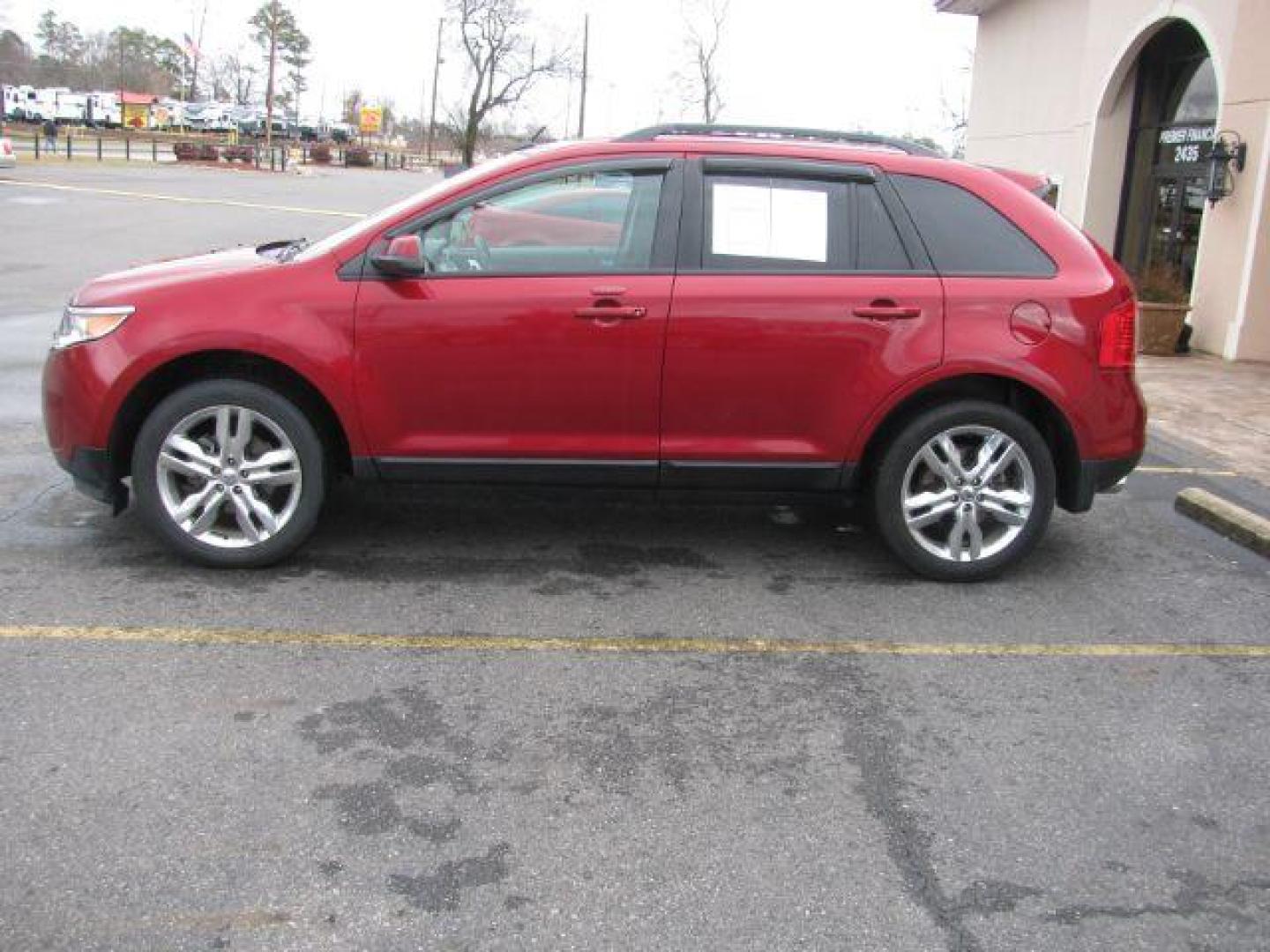 2013 Maroon Ford Edge SEL FWD (2FMDK3JC2DB) with an 3.5L V6 DOHC 24V engine, 6-Speed Automatic transmission, located at 2443 Albert Pike, Hot Springs, AR, 71913, (501) 623-6255, 34.492222, -93.109993 - LISTED FEATURES MAY BE OPTIONAL AND NOT INCLUDED ON THIS VEHICLE!!! - Photo#1