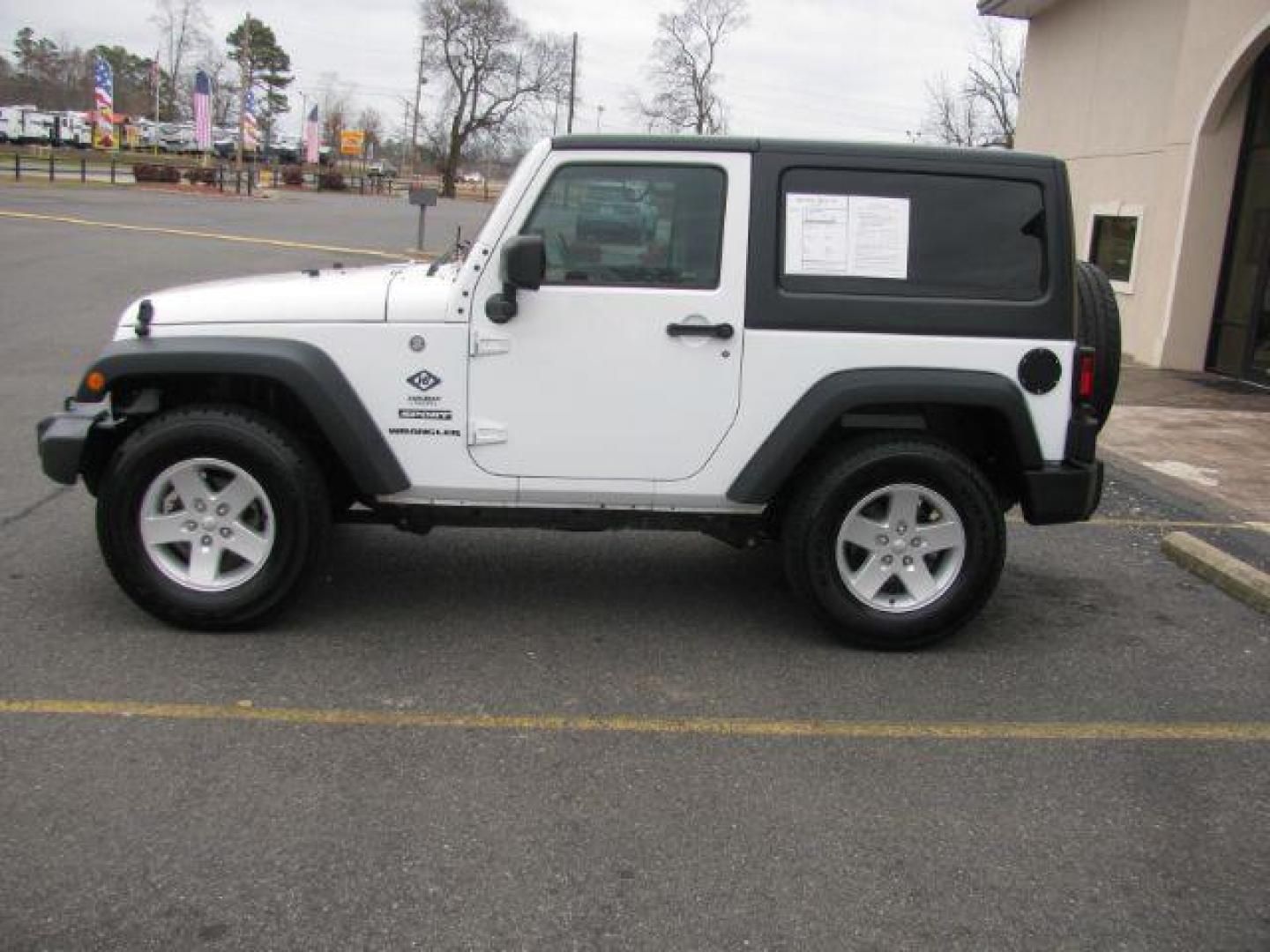 2016 White Jeep Wrangler Sport 4WD (1C4AJWAG3GL) with an 3.6L V6 DOHC 24V FFV engine, located at 2443 Albert Pike, Hot Springs, AR, 71913, (501) 623-6255, 34.492222, -93.109993 - Photo#1