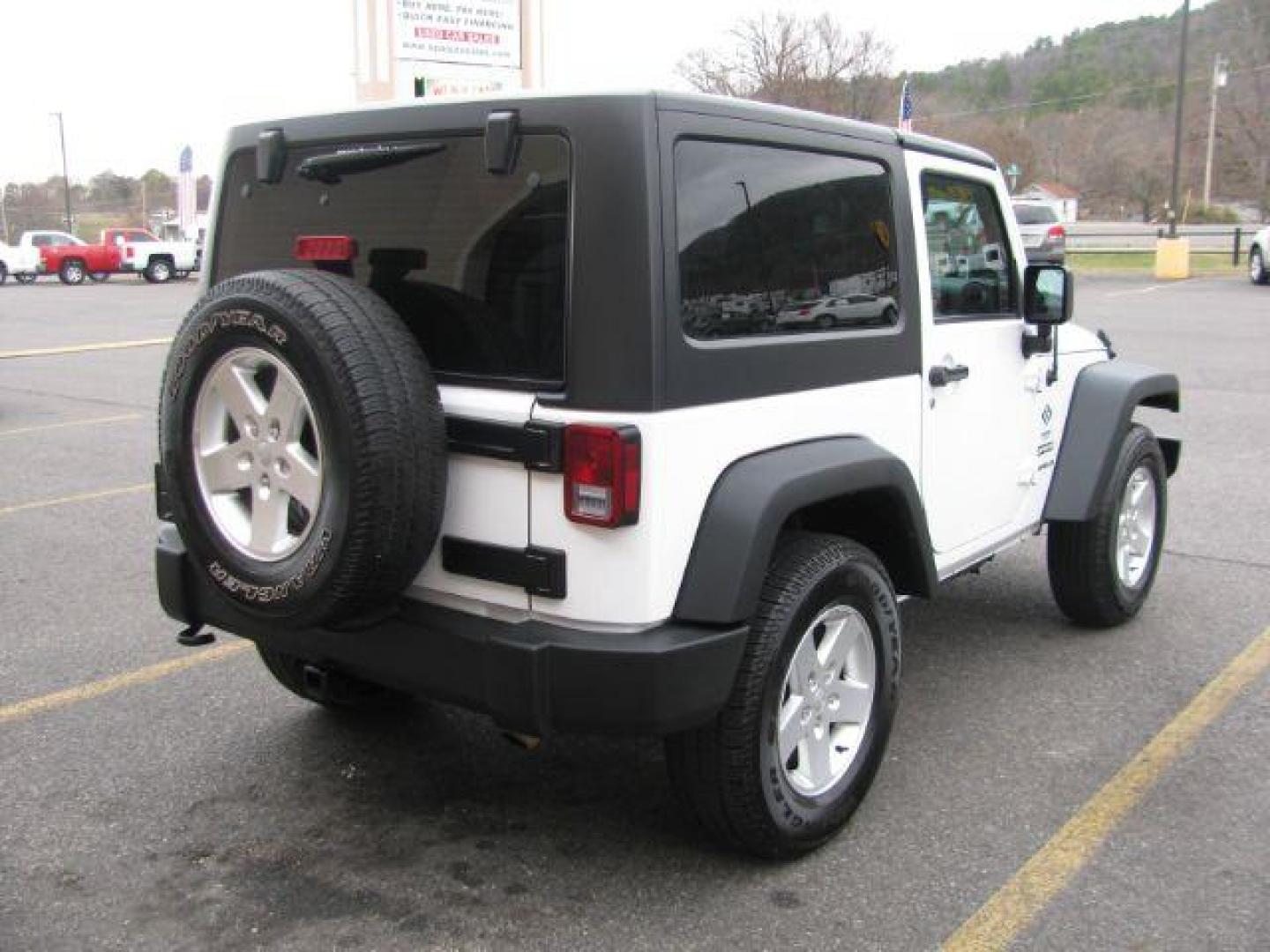 2016 White Jeep Wrangler Sport 4WD (1C4AJWAG3GL) with an 3.6L V6 DOHC 24V FFV engine, located at 2443 Albert Pike, Hot Springs, AR, 71913, (501) 623-6255, 34.492222, -93.109993 - Photo#3