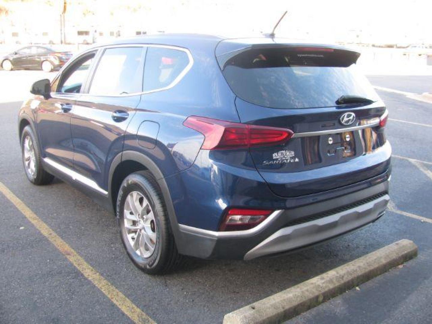 2019 Blue Hyundai Santa Fe SE 2.4 (5NMS23AD4KH) with an 2.4L L4 DOHC 16V engine, 8-Speed Automatic transmission, located at 2443 Albert Pike, Hot Springs, AR, 71913, (501) 623-6255, 34.492222, -93.109993 - Photo#2