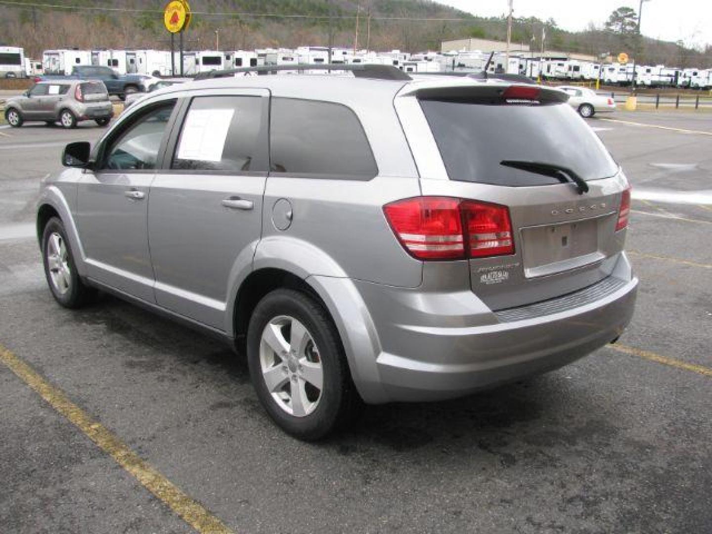 2016 Silver Dodge Journey SE (3C4PDCAB9GT) with an 2.4L L4 DOHC 16V engine, 4-Speed Automatic transmission, located at 2443 Albert Pike, Hot Springs, AR, 71913, (501) 623-6255, 34.492222, -93.109993 - Photo#2