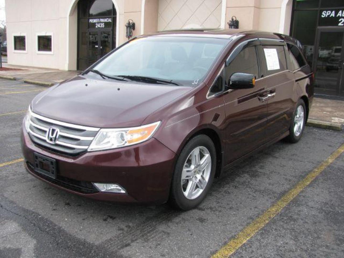 2013 Maroon Honda Odyssey Touring (5FNRL5H96DB) with an 3.5L V6 SOHC 24V engine, 5-Speed Automatic transmission, located at 2443 Albert Pike, Hot Springs, AR, 71913, (501) 623-6255, 34.492222, -93.109993 - Photo#0